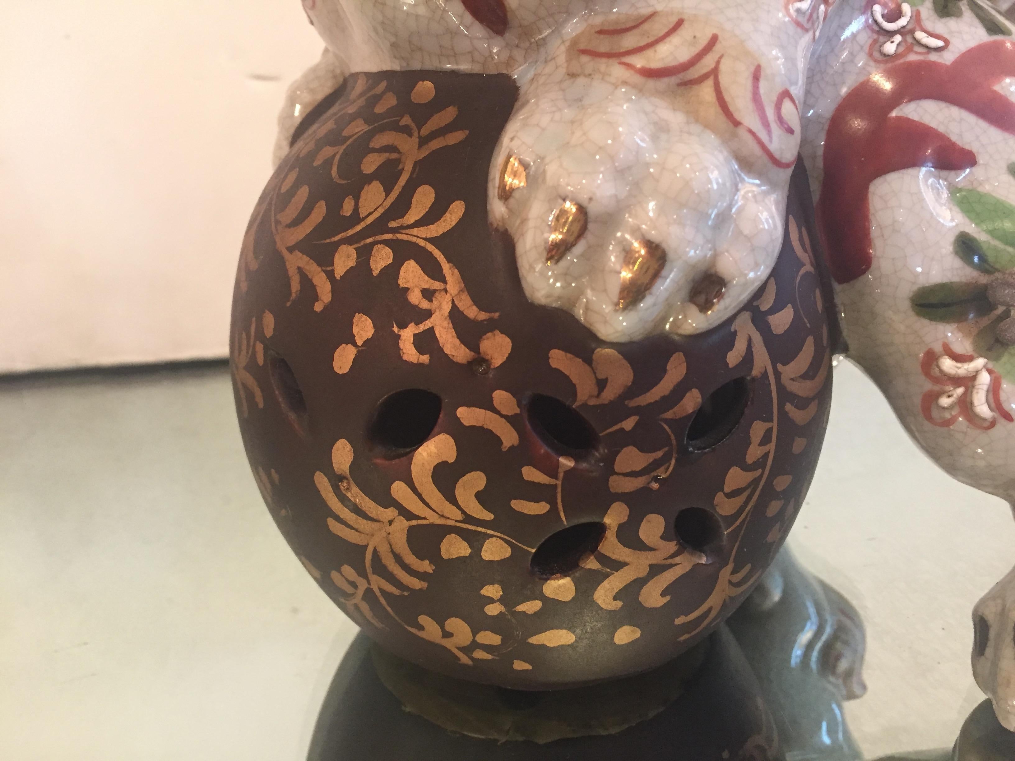 Playful Pair of Chinese Porcelain Foo Dogs 1