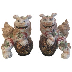 Playful Pair of Chinese Porcelain Foo Dogs