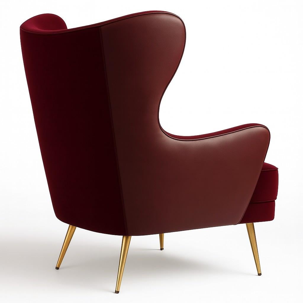 This contemporary armchair is a study in minimalist elegance and subtle luxury. It features a plush, upholstered seat and backrest that are beautifully defined by a simple piping detail, which outlines the chair's clean silhouette. The armchair is