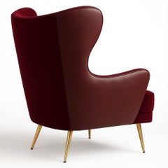 Sculptural Armchair with Winged Back and Tapered Brass Legs By José Castro