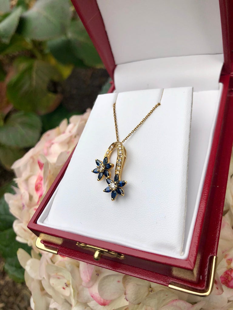 Women's Playful Spinning Flowers Sapphire Diamond 18 Karat Yellow Gold Pendant on Chain For Sale