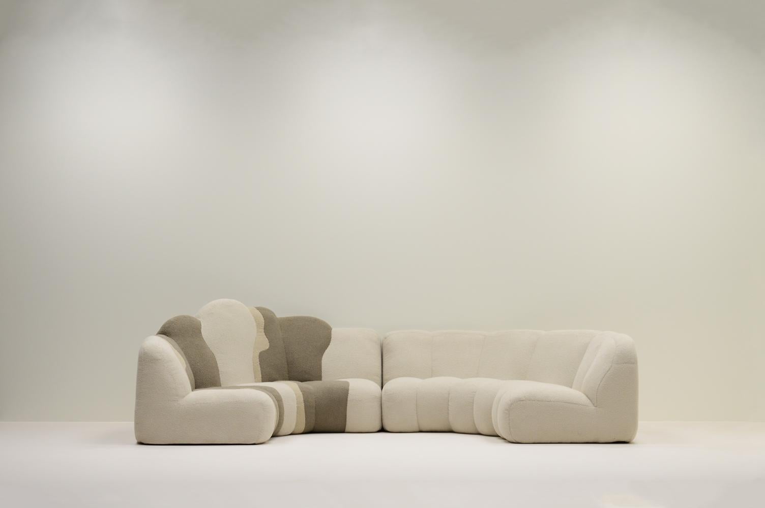 Playful sofa by Design studio Polster mit pep, Germany 80s. Every sofa they design is unique. Two sections make one large lounge sofa, but can be used seperately. Reupholstered in a fine teddy fabric. True to the original design, the left section is