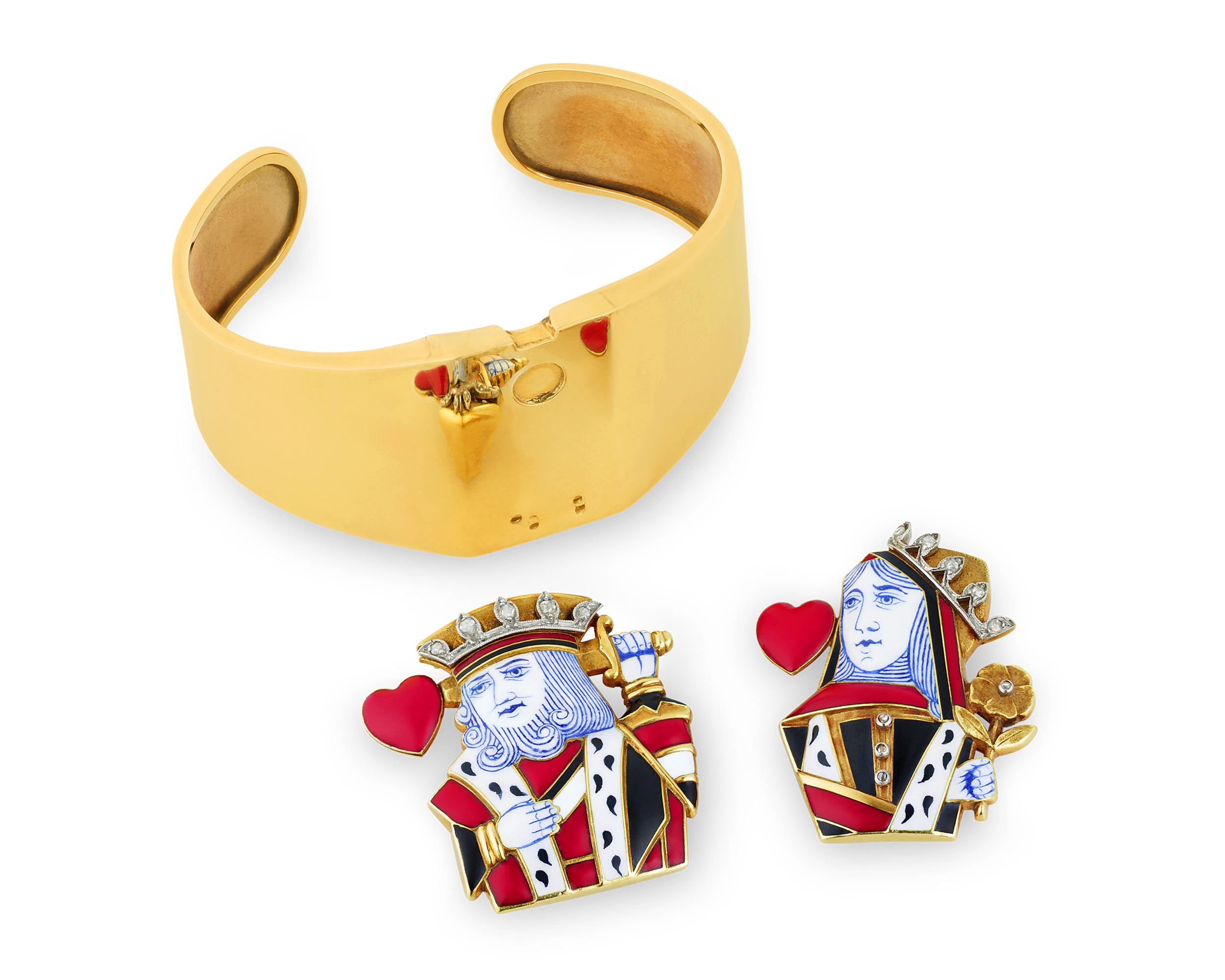 Exuding the decadence of a bygone era, this pair of playing card clip brooches hail from the revered French jeweler Cartier. Each pin is crafted of red, white, blue and black enamel to form the iconic designs of the Queen and King of Hearts, and the