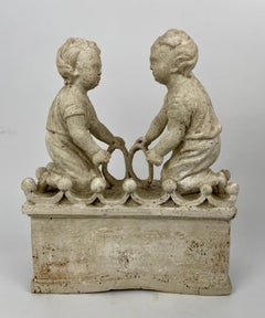 Bambini che giocano, scolpiti a mano