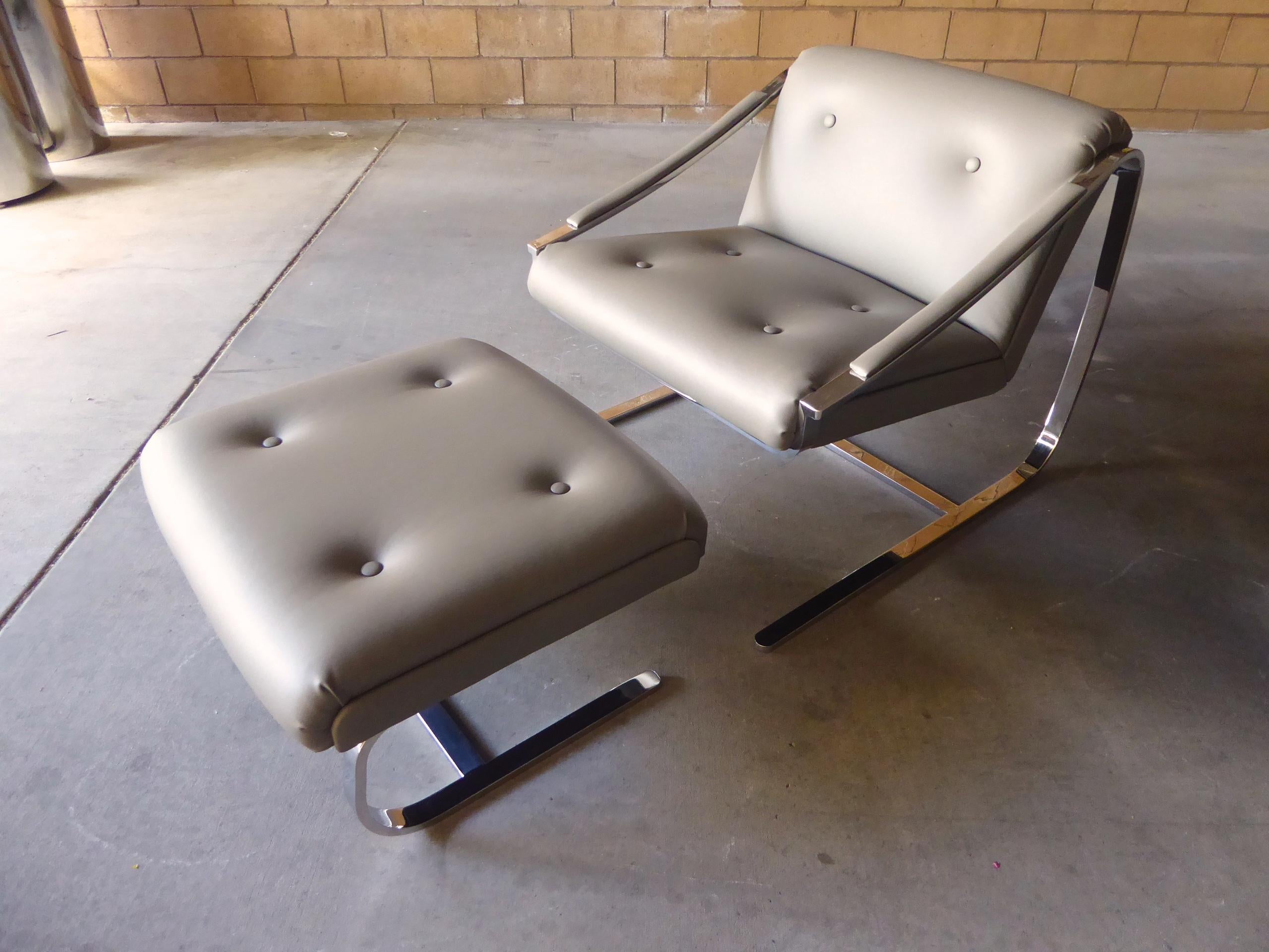 The Plaza lounge chair and matching ottoman made by American manufacturer Brueton. Both pieces are constructed of solid polished stainless steel and have been recently reupholstered in top quality leather. The cantilevered design of the chair allows