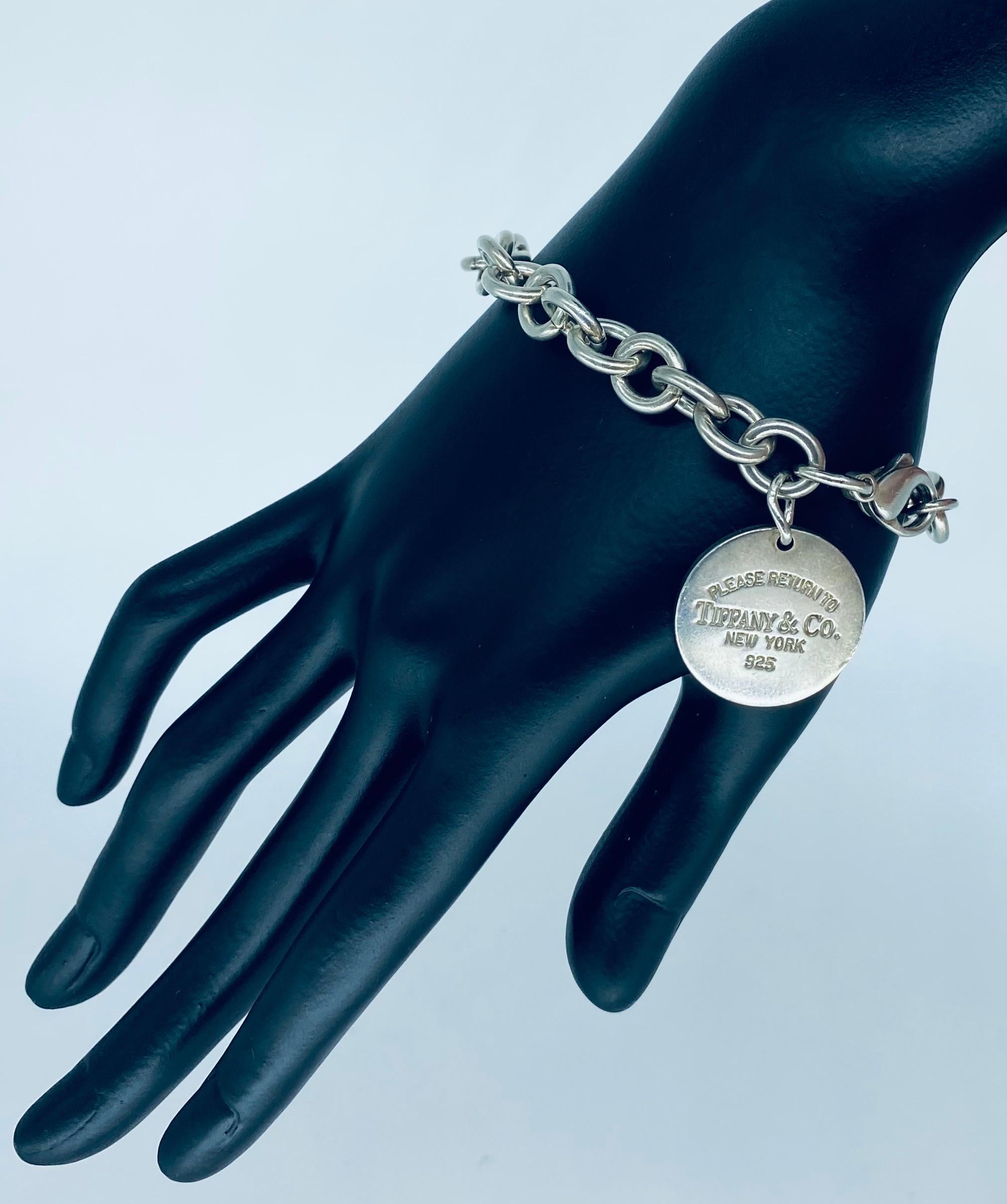 Please Return To Tiffany & Co. New York 925 Sterling Silver Bracelet. Classic Tiffany & Co iconic tag bracelet. The bracelet is 8 inches long. 100% authentic Tiffany & co necklace. No original box or papers. The bracelet weights 36.8 grams and