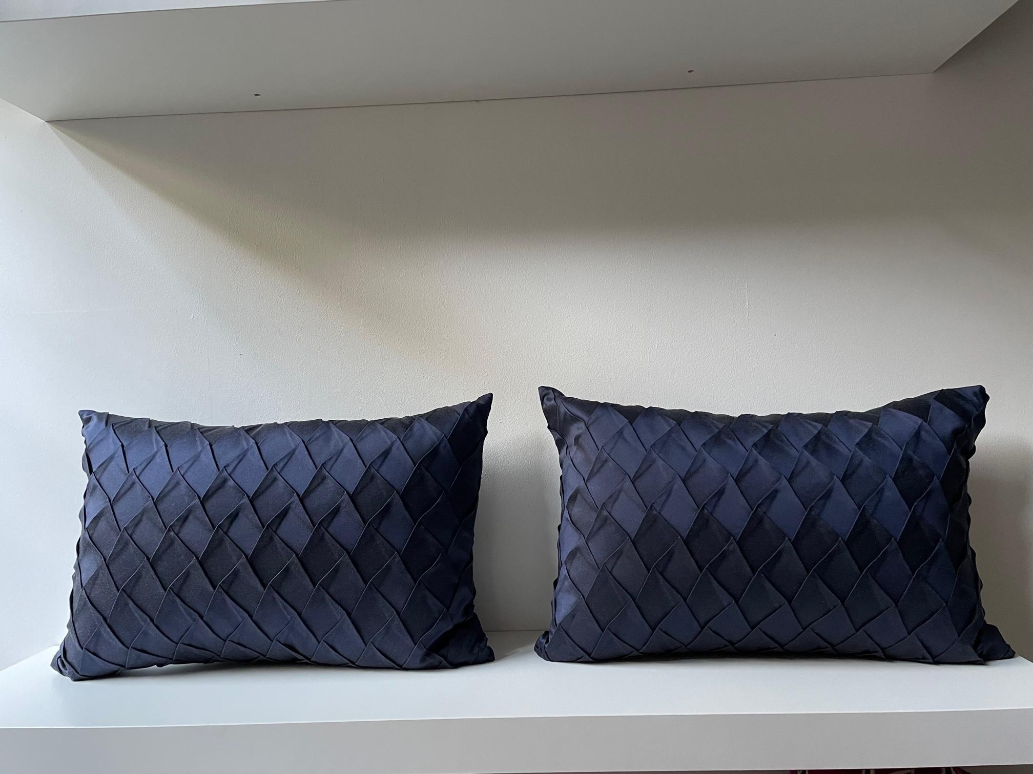 One pair silk cushions with embossed front panel in steam pleated opal pattern, handwoven silk Bruno Triplet color dark blue / bewitched, back panel silk satin color dark blue, cushion size 55 x 55cm, concealed zipper in the bottom seam, inner pad