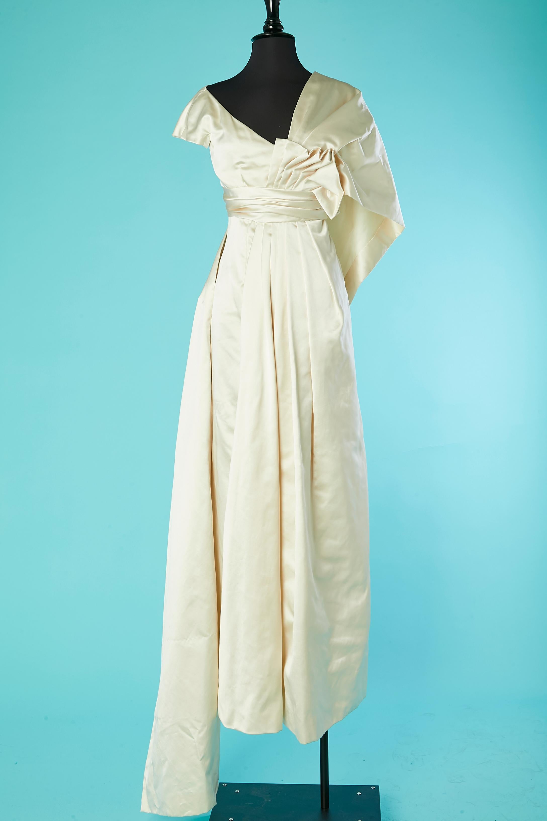 Silk satin ivory evening gown pleated on the front and stole. The dress's name is 