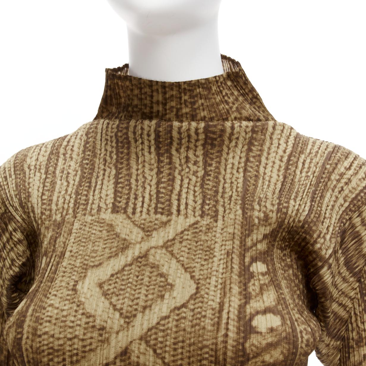 PLEATS PLEASE ISSEY MIYAKE brown Tromp Loeil cable knit print plisse top
Reference: TGAS/D00330
Brand: Issey Miyake
Material: Feels like polyester
Color: Brown
Pattern: Photographic Print
Closure: Pullover

CONDITION:
Condition: Excellent, this item