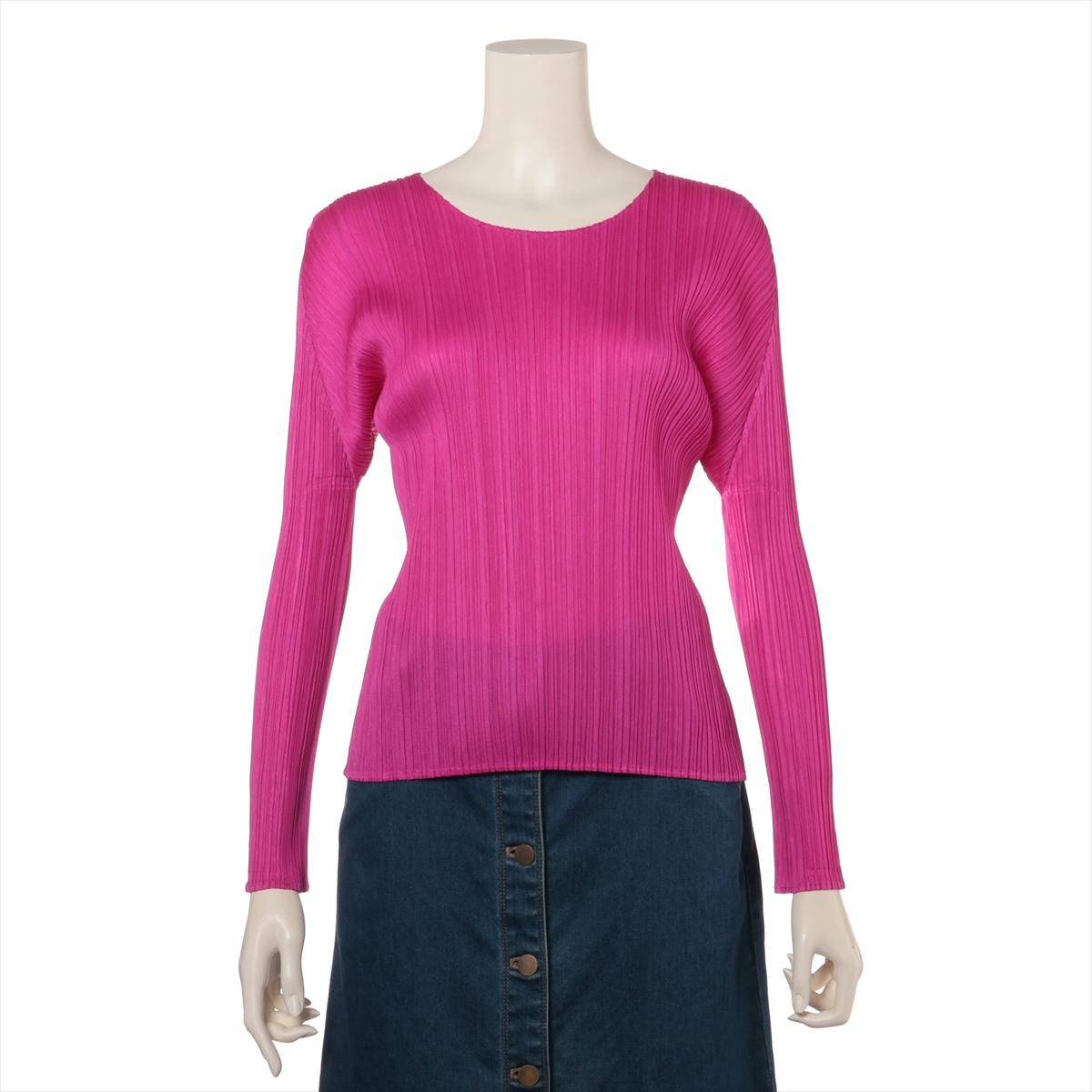 Retail: $445

The Pleats Please Issey Miyake Long Sleeve Blouse in hot pink is a vibrant and contemporary piece that showcases the brand's iconic pleating technique. Crafted from lightweight, wrinkle-resistant fabric, the blouse offers both style