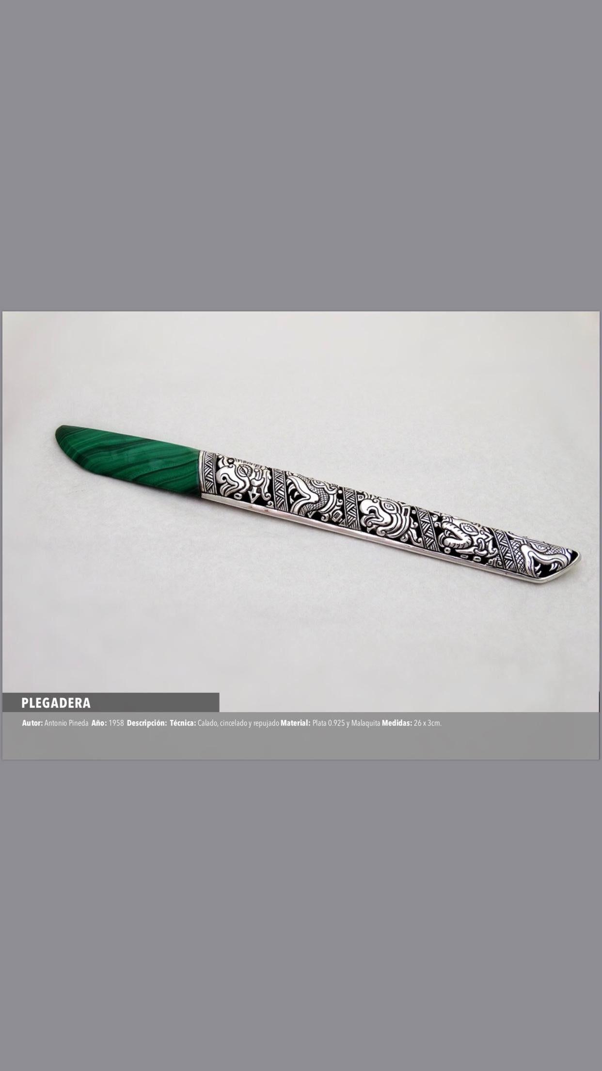 Silver and malachite folding, with chiseled Mayan details on the handle. 1958