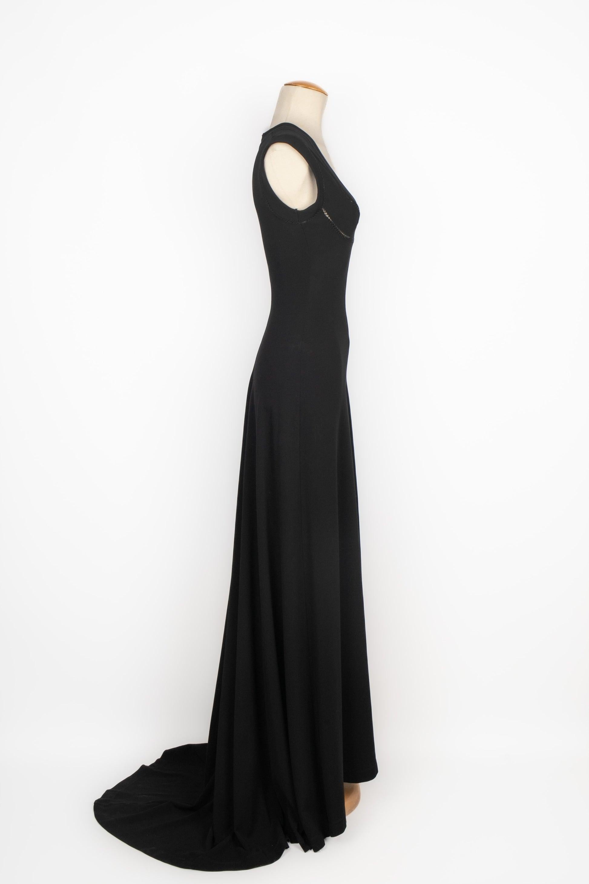 Plein Sud - (Fabricado en Francia) Vestido largo negro. Talla 36FR indicada.

Más información:
Estado: Muy buen estado
Dimensiones: Pecho: 40 cm - Cintura: 27 cm - Caderas: 41 cm - Largo: 150 cm

Referencia del vendedor: VR69
