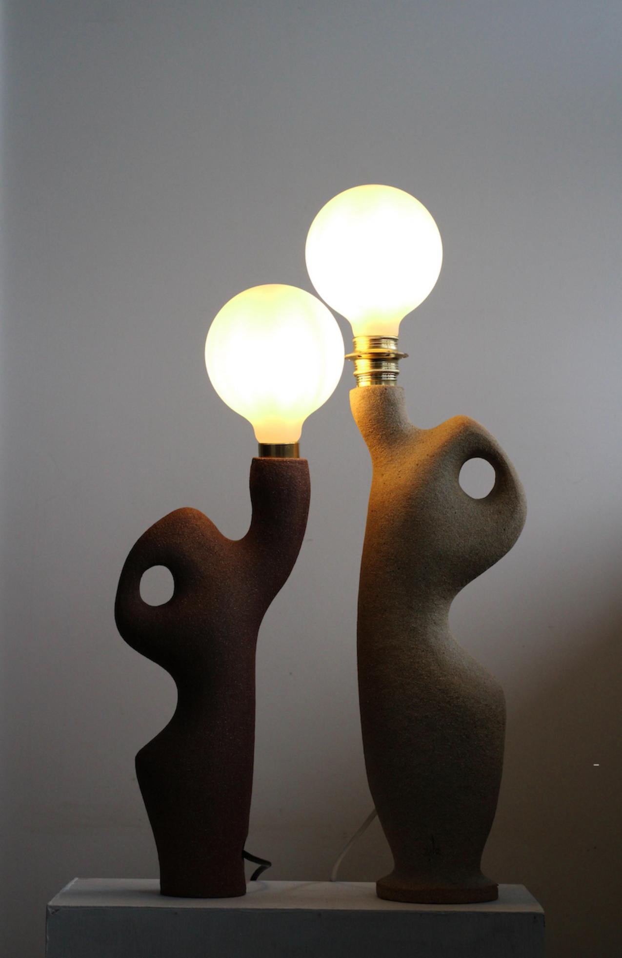 Pleomorph 50A lamp by Abid Javed
Dimensions: D 20 x 50 cm (Dimensions are variable)
Materials: Ceramic 
Multiple clay color and size options.

Coiled hollow form with a non-glazed ceramic surface. Bulb optional.

All our lamps can be wired