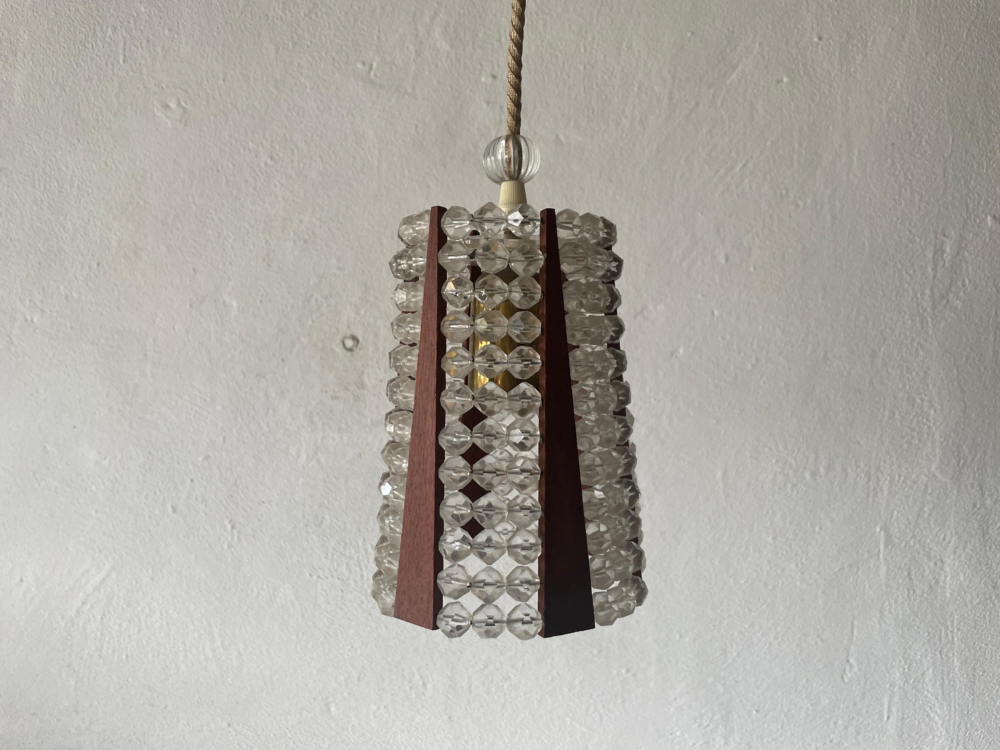Plexiglass Beads and Teak Wood Ceiling Lamp, 1960s, Germany en venta
