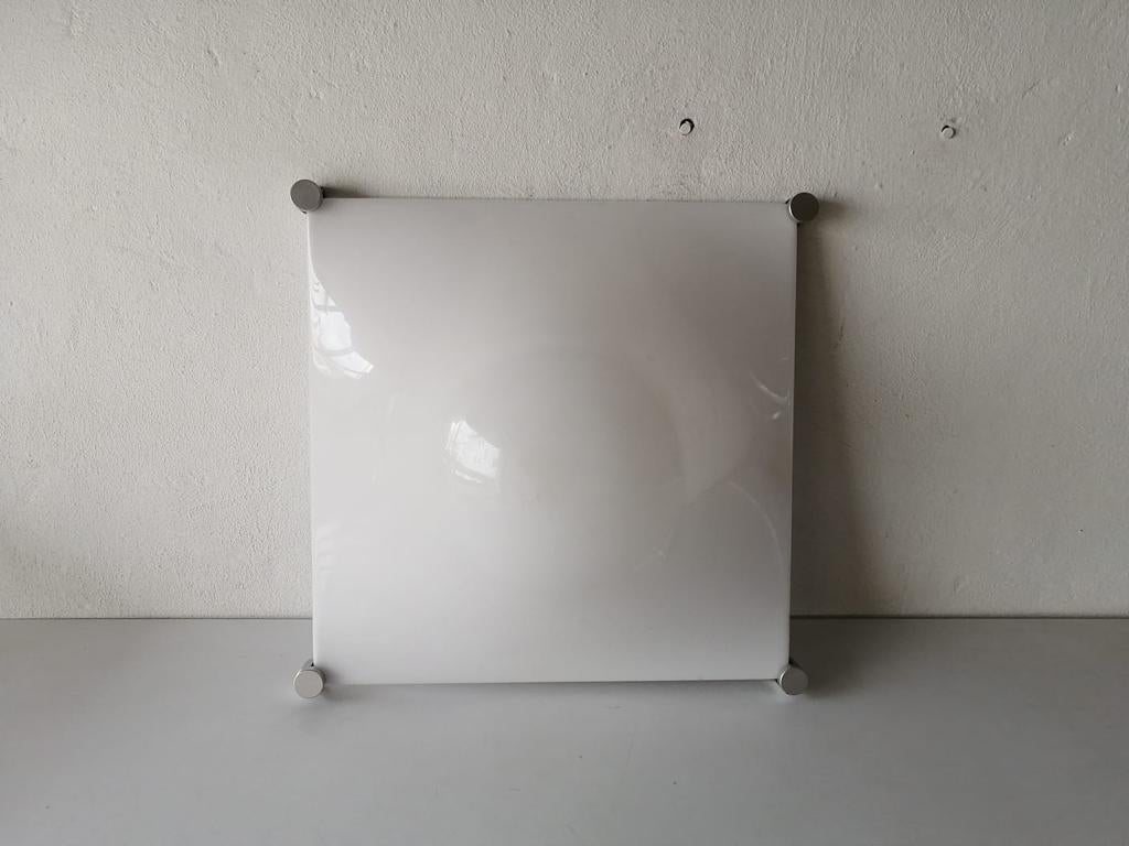 White plexiglass bubble design large wall or ceiling lamp by Elio Martinelli, 1960s, Italy.

Mid-Century Modern sculptural very elegant wall light. 

It is very ideal and suitable for all living areas.

Metal base and chrome 4 corners.

Lamp