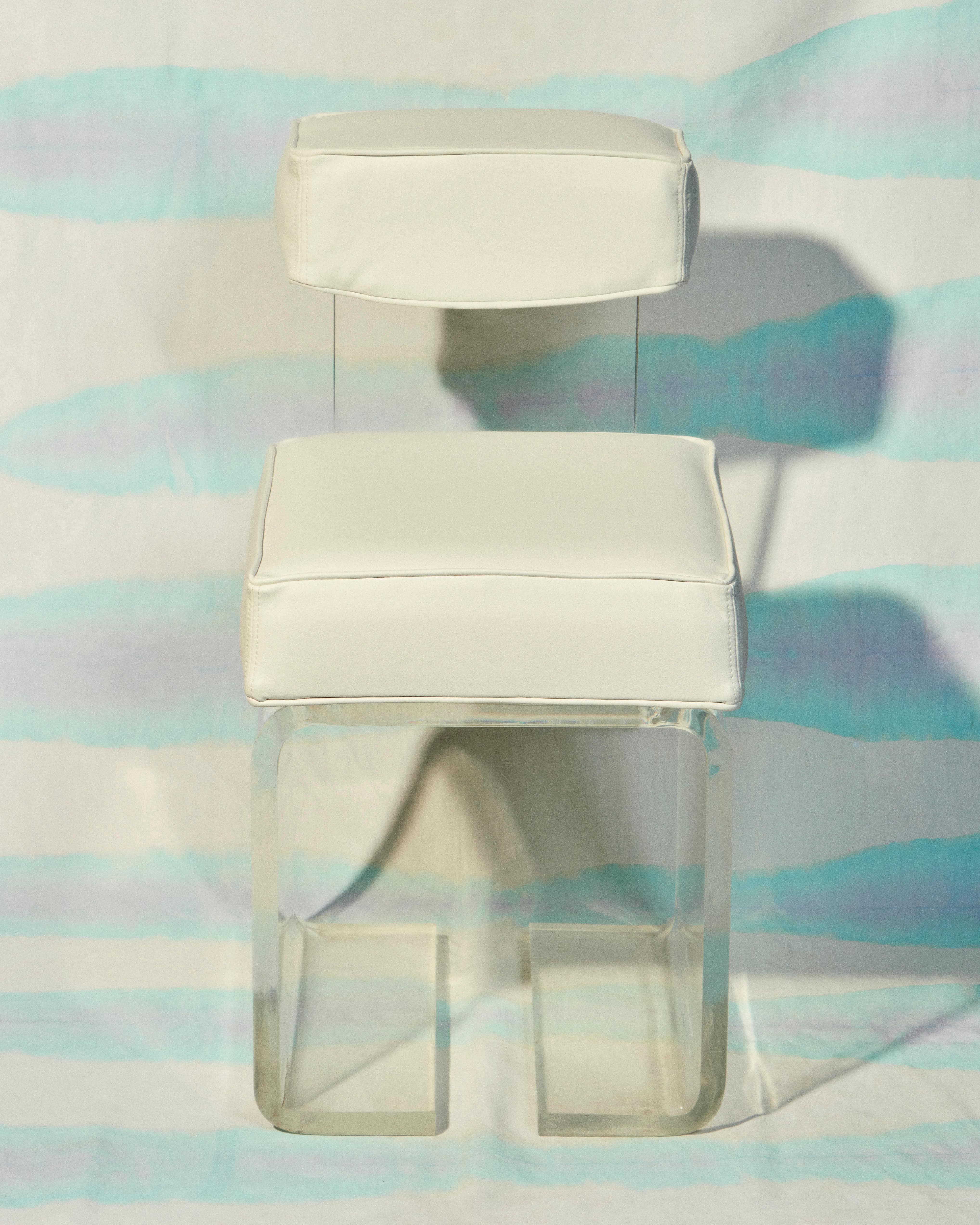 Rare chair by André Courrèges in plexiglass with white leather cover
France, circa 1970