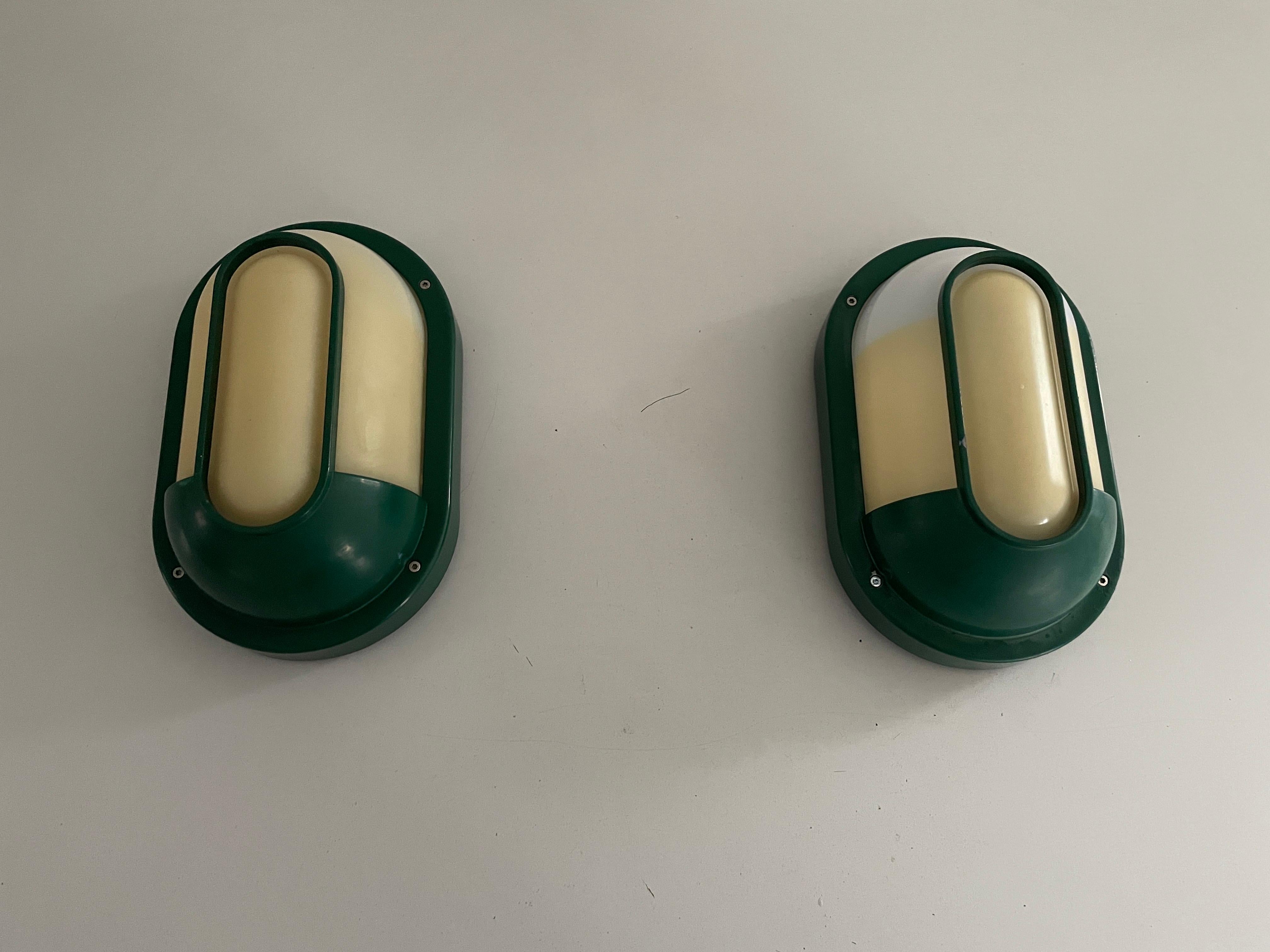 Plexiglass & Green Metal Pair of Sconces by Bonalux, 1980s, Germany

Very elegant and Minimalist outdoor sconces

Lamps are in very good condition.

These lamps works with E27 standard light bulbs. 
Wired and suitable to use in all countries.