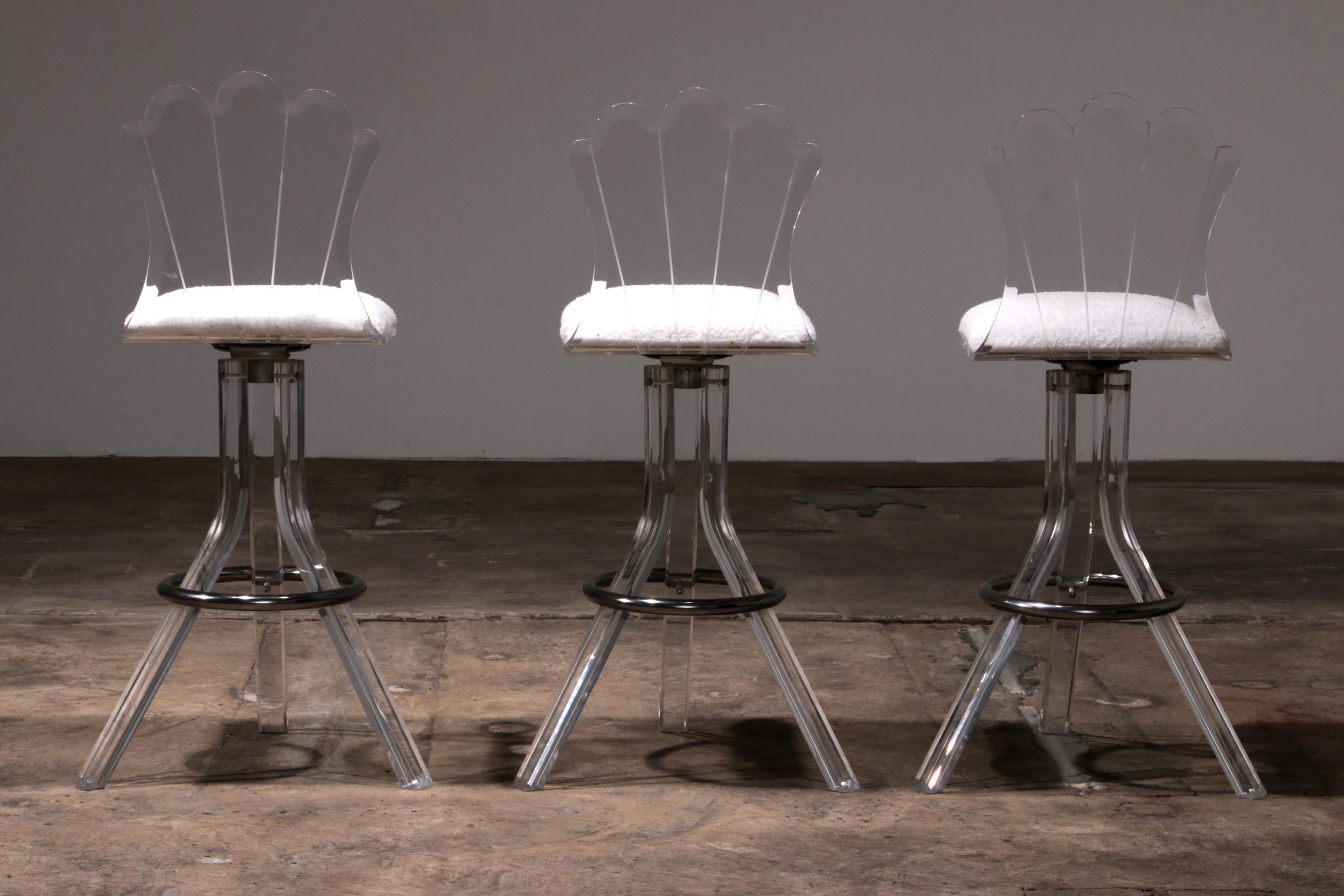 Late 20th Century Plexiglass lucite bar stools and chrome swivel bar chairs, Hill Manufacturers For Sale