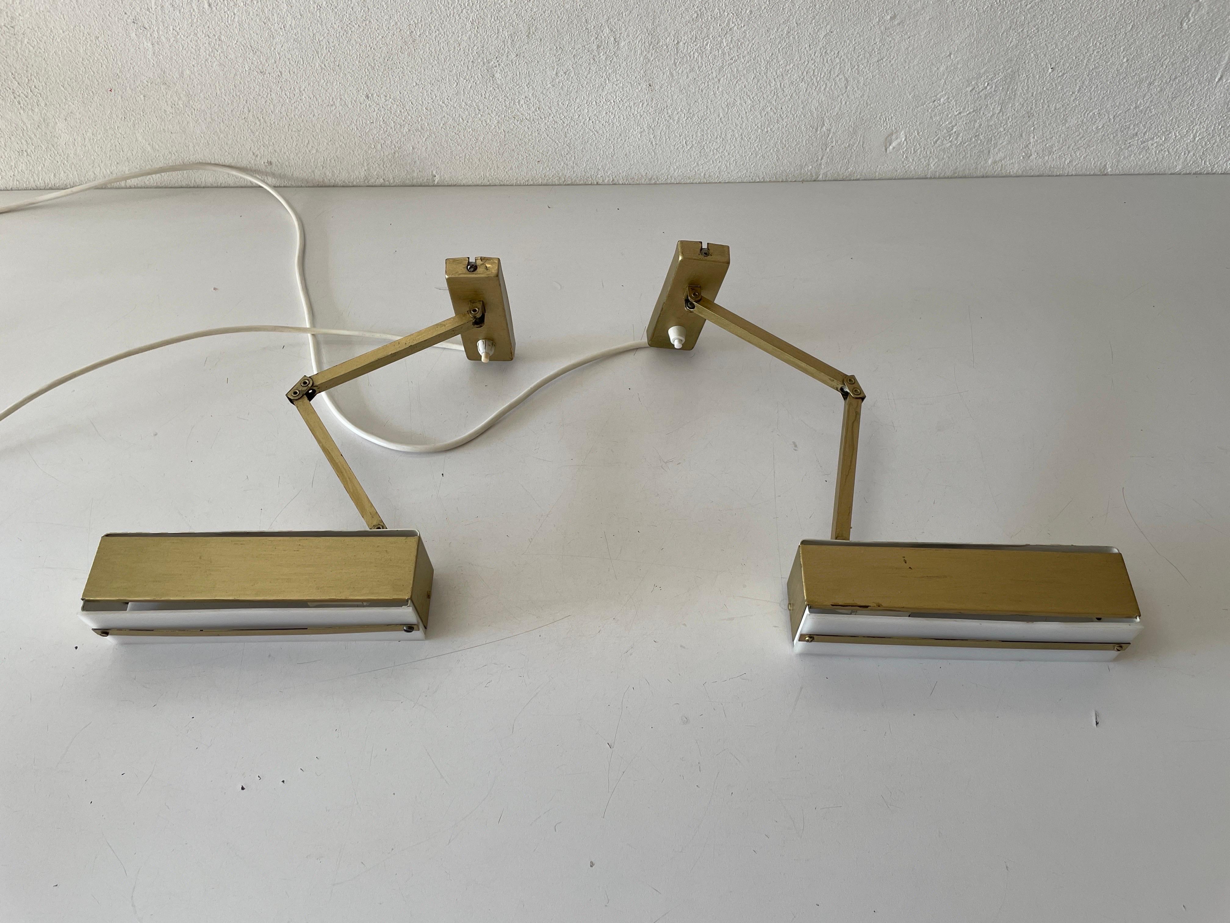 Mid-century Gold Metal and White Plexiglass Pair of Sconces with Adjustable Arms by Paul Neuhaus Leuchten, 1950s, Germany

Adjustable Reflectors

Very elegant and Minimalist wall lamps.
There are two switch on-off on the base 

Lamps are in