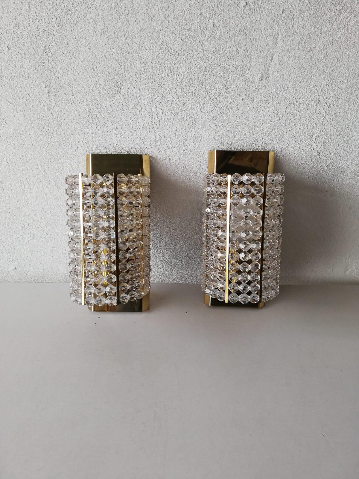 Plexiglass pair of sconces by Emil Stejnar for Rupert Nikoll, 1960s Austria

All plexiglass beads are completed.

Very nice high quality wall lamps.

Frames are made of brass.
Switch on-off button on the brass base.

Lamps are in very good