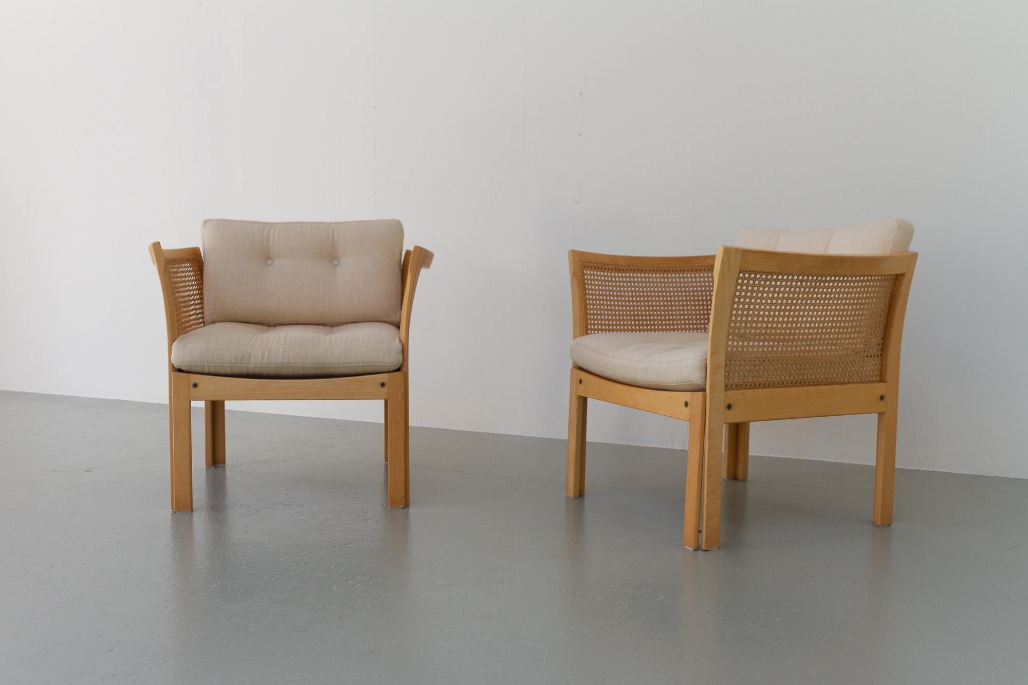 Plexus Easy Chairs by Illum Wikkelsø for CFC Silkeborg 1970s, Set of 2.
Pair of Danish Mid-century modern lounge chairs designed by Illum Wikkelsø for CFC Silkeborg, Denmark. Elegant and comfortable easy chairs in beech with beautiful wicker