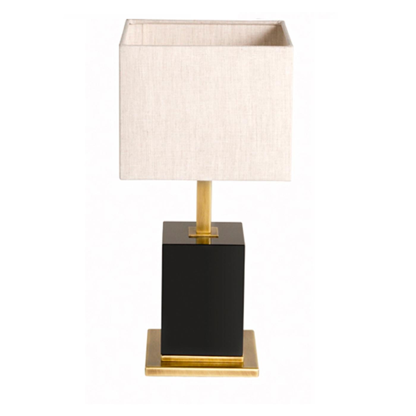 Timeless materials and a strong geometric theme characterize the Plino table lamp from a small collection of complementary styles. A seamless addition to a traditional living room, the table lamp features walnut veneer with a dark glossy finish and