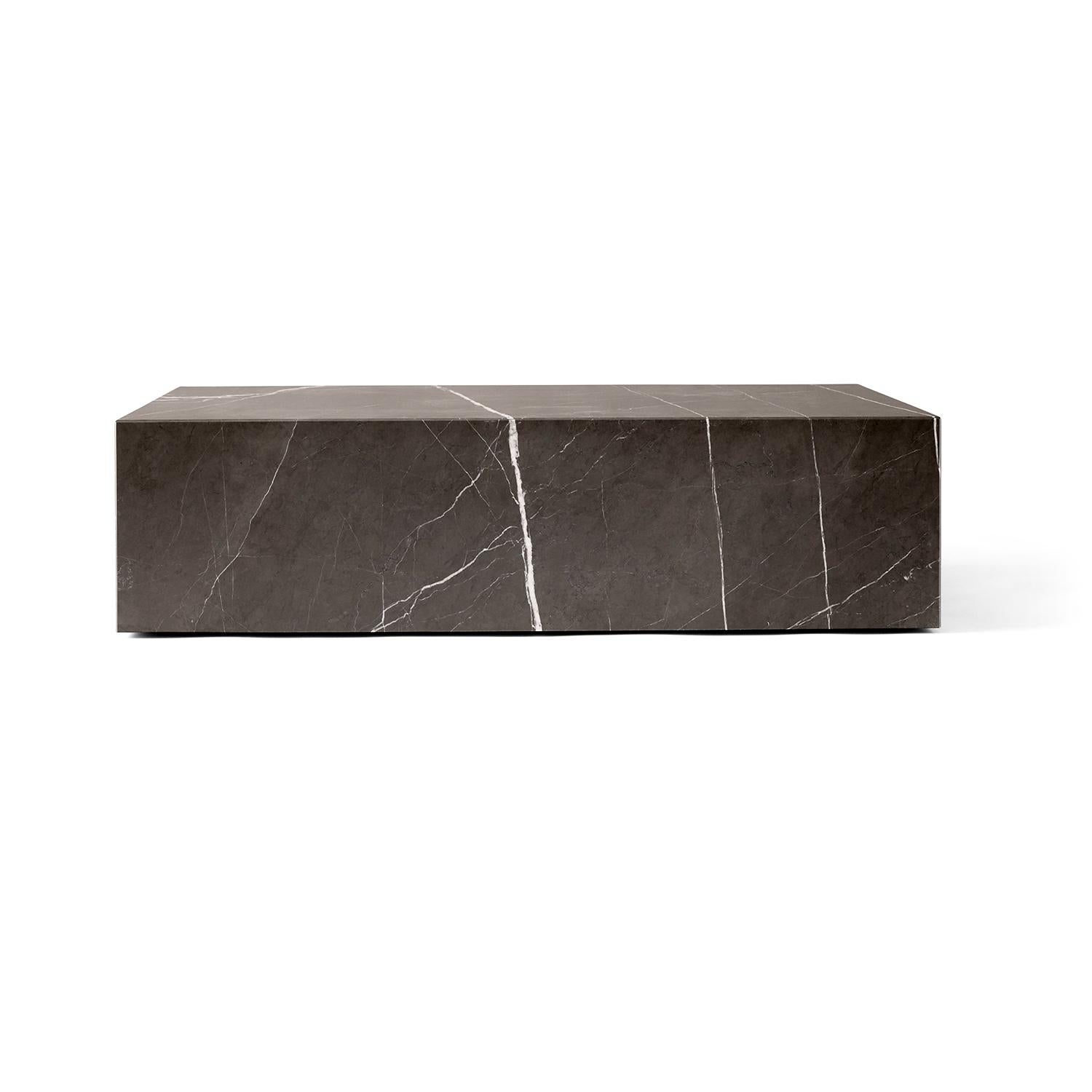 As versatile as it is timeless, the marble Plinth serves the dual purpose of being a beautiful, sculptural piece on its own and highlighting whatever objects rest upon it. The honed marble carries an air of sophistication and elegance to elevate any