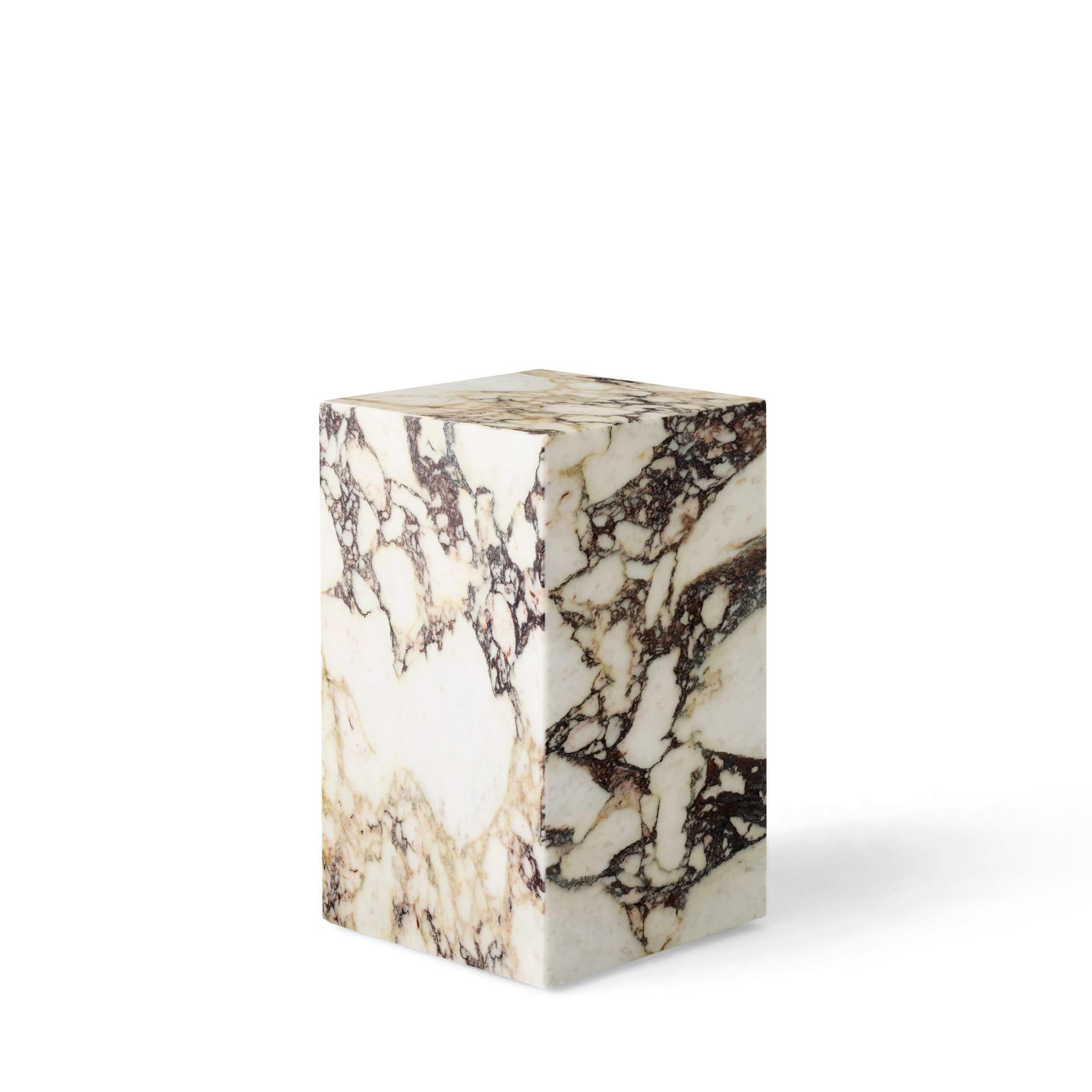 As versatile as it is timeless, the marble Plinth serves the Dual purpose of being a beautiful, sculptural piece on its own and highlighting whatever objects rest upon it. The honed marble carries an air of sophistication and elegance to elevate any
