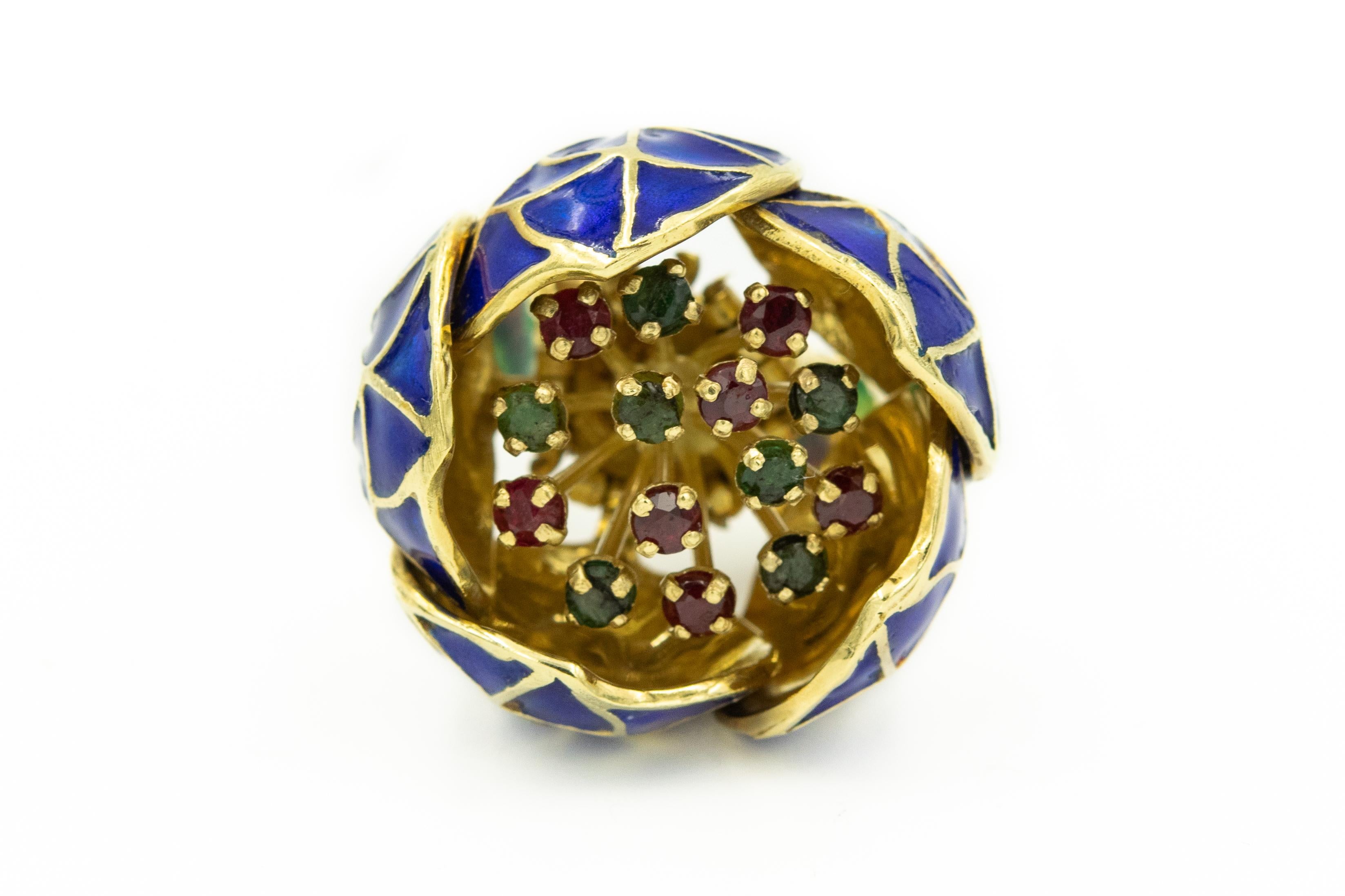 This fantastic set was made between 1950s - 1960s.

The plique-à-jour enamel, emerald and ruby en tremblant flower brooch is made like a piece of art.  It can be worn either with open or shut petals which are cobalt blue enamel.  Inside the flower,