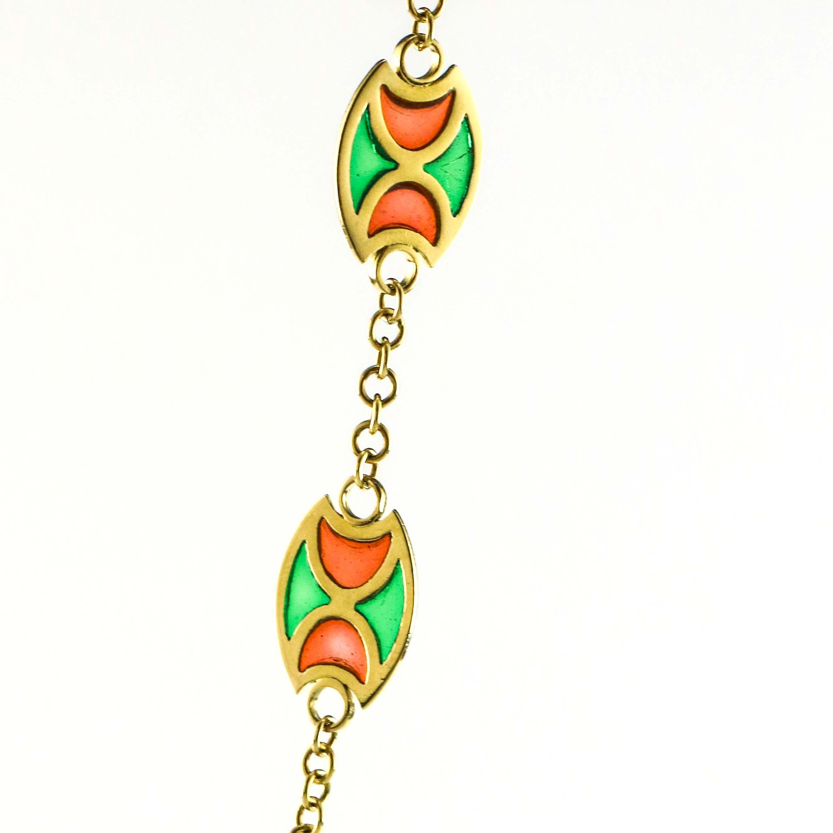 Long station necklace in 18 karat yellow gold with orange and green Plique-A-Jour enamelling.  There are 15 stations. Made in Italy.