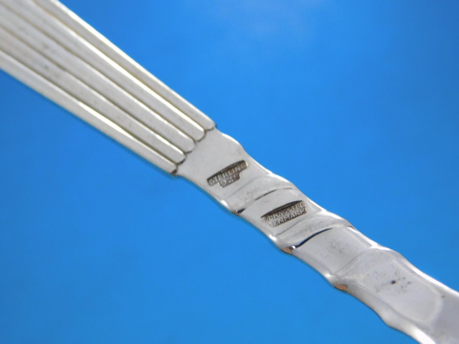 Plisse aka Pleated by E. Dragsted Danish sterling silver flatware set - 40 pieces. The pattern design is truly striking. This scarce set includes:
8 Knives, long handles, 8 3/4