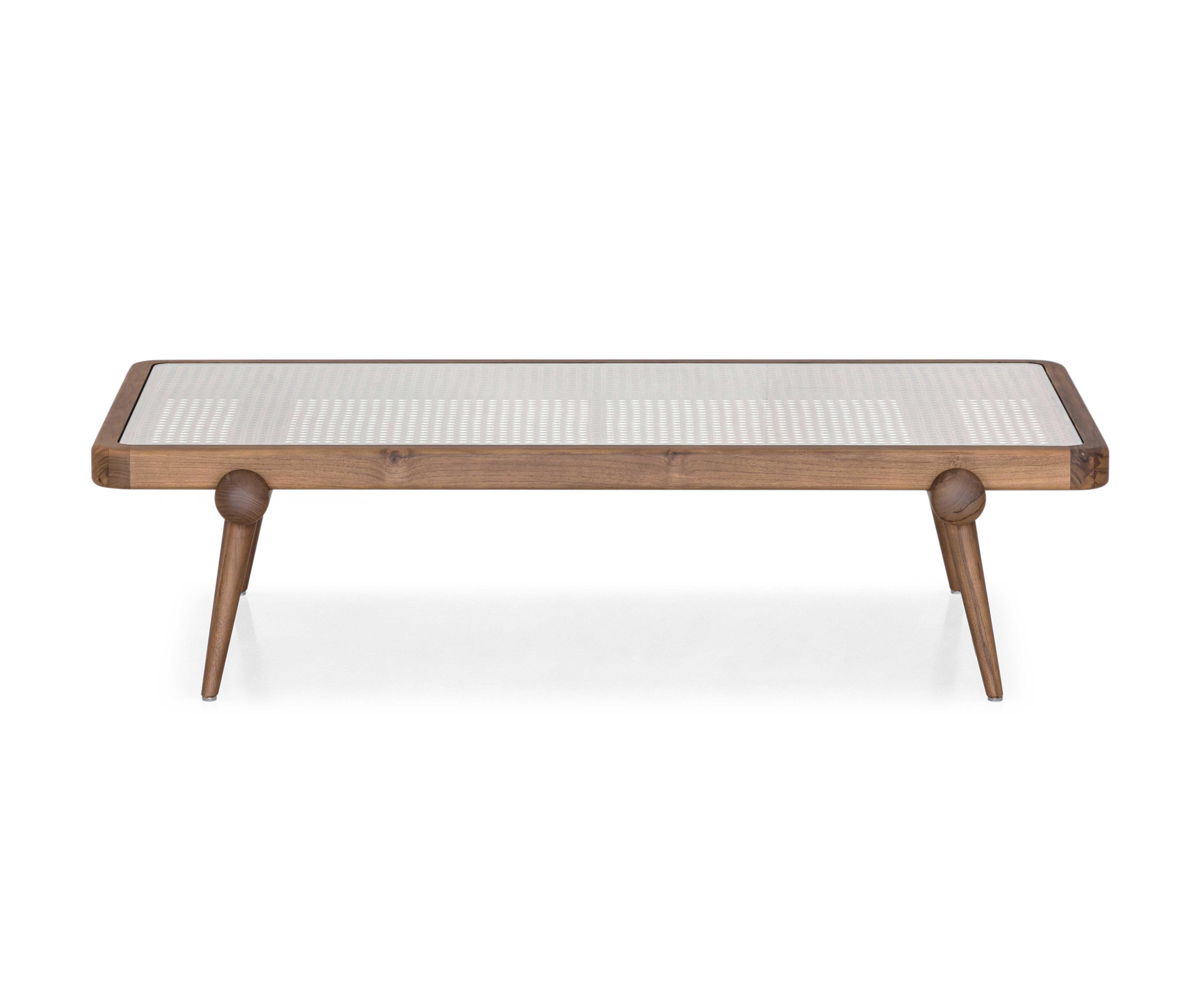 With its sculptural form and thoughtful construction, the Plot coffee table by Uultis strikes an elegant balance between classic craftsmanship and contemporary function. Designed and made in Brazil, this piece showcases a walnut-finished wood frame