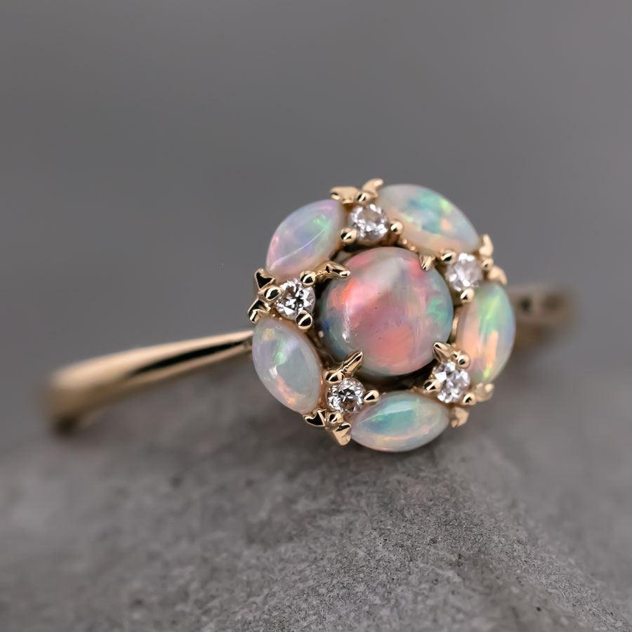 Plum Blossom Australian Black Opal Diamond Engagement Ring 18K Yellow Gold.



Free Domestic USPS First Class Shipping! Free Gift Bag or Box with every order!

Opal—the queen of gemstones, is one of the most beautiful gemstones in the world. Every