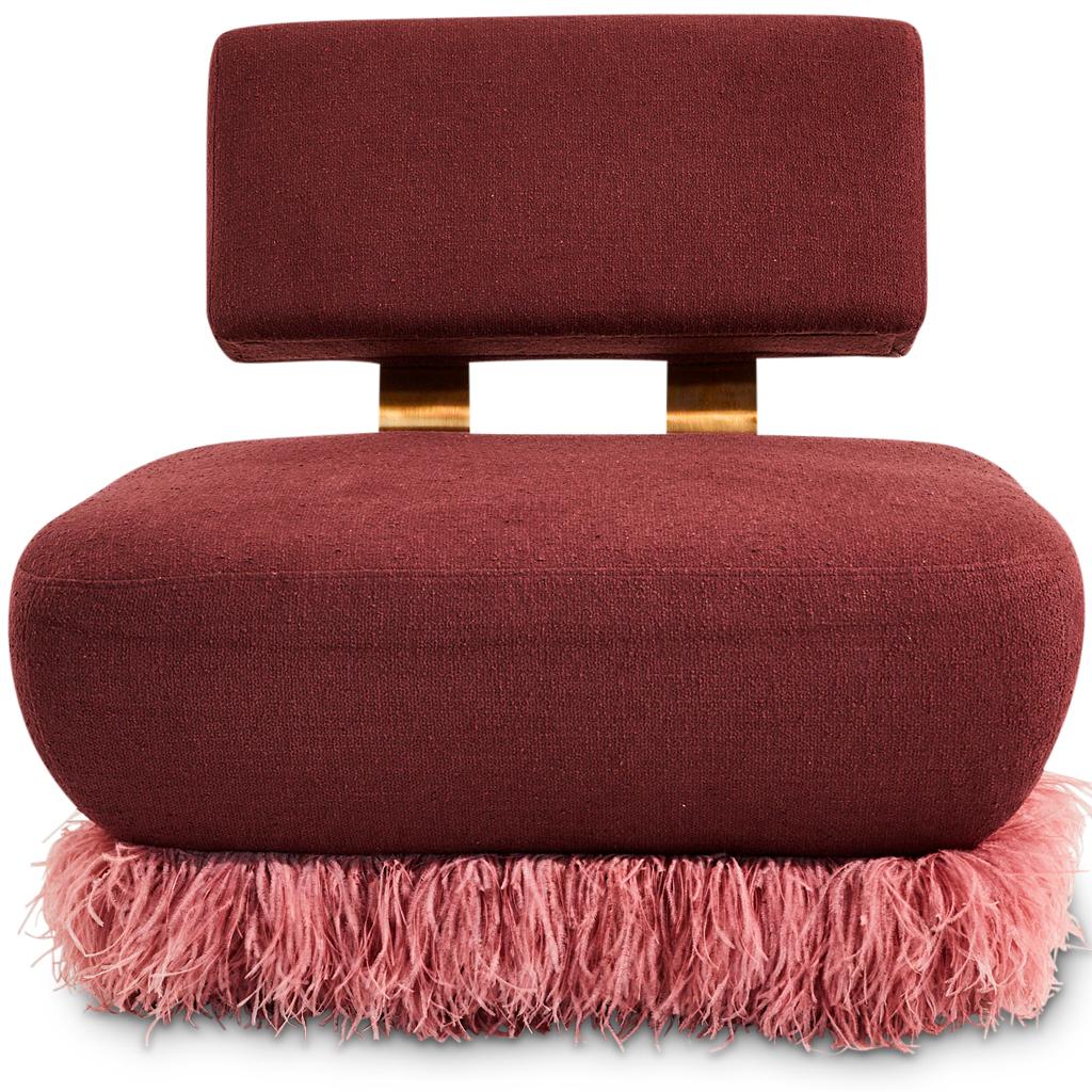 A new addition to the the Ostrich Fluff collection designed by Egg Designs and manufactured in South Africa.
This gorgeous plum Boucle' lounge chair is a harmonious play on materials that results in sophisticated statement of a piece. 
The Boucle