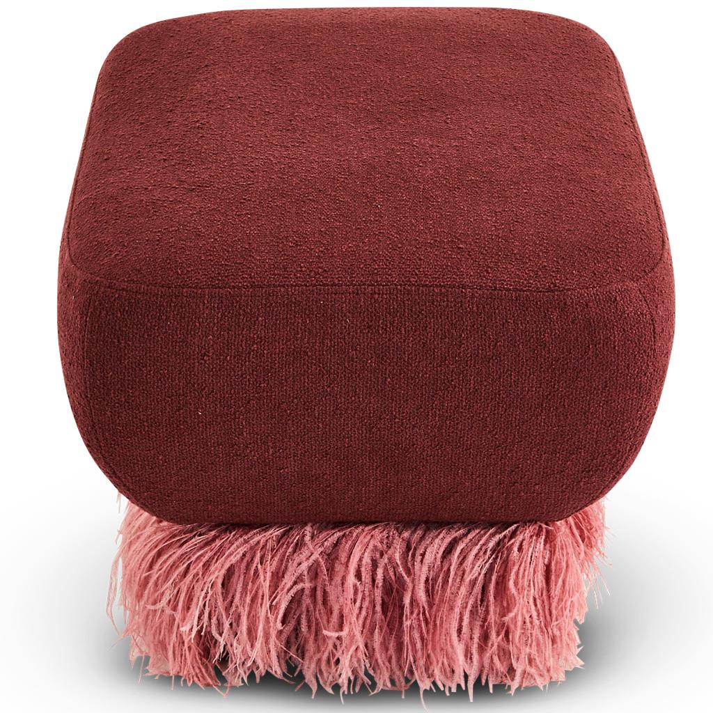 A new addition to the the Ostrich Fluff collection designed by Egg Designs and manufactured in South Africa.
This gorgeous plum Boucle' ottoman is a harmonious play on materials that results in sophisticated statement piece. 
The Plum Boucle'