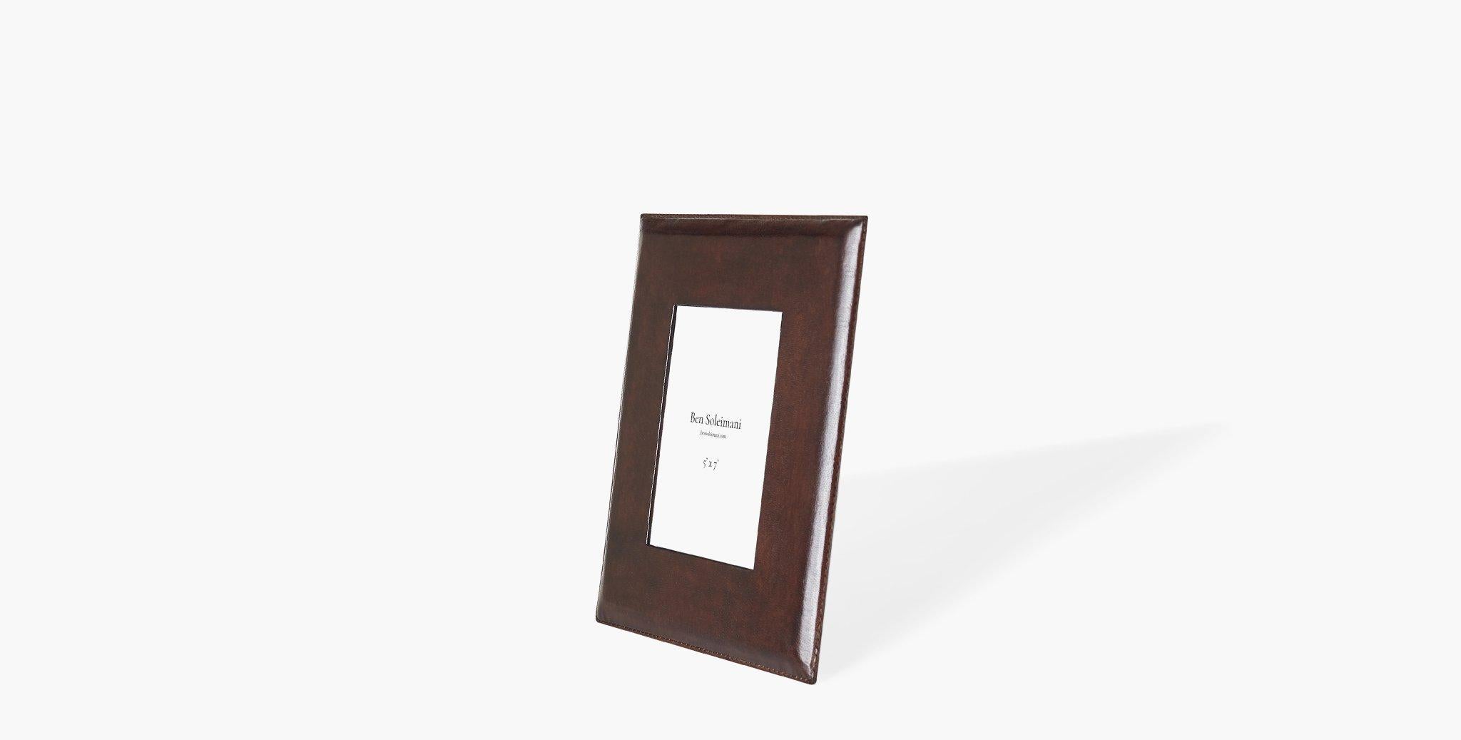 Our Pluma Leather Picture Frame is crafted in rich leather with a glass inset, providing a classic piece for your family memories. Our handcrafted fabrics, leathers, and finishes are inspired by the natural variations within fibers, textures, and