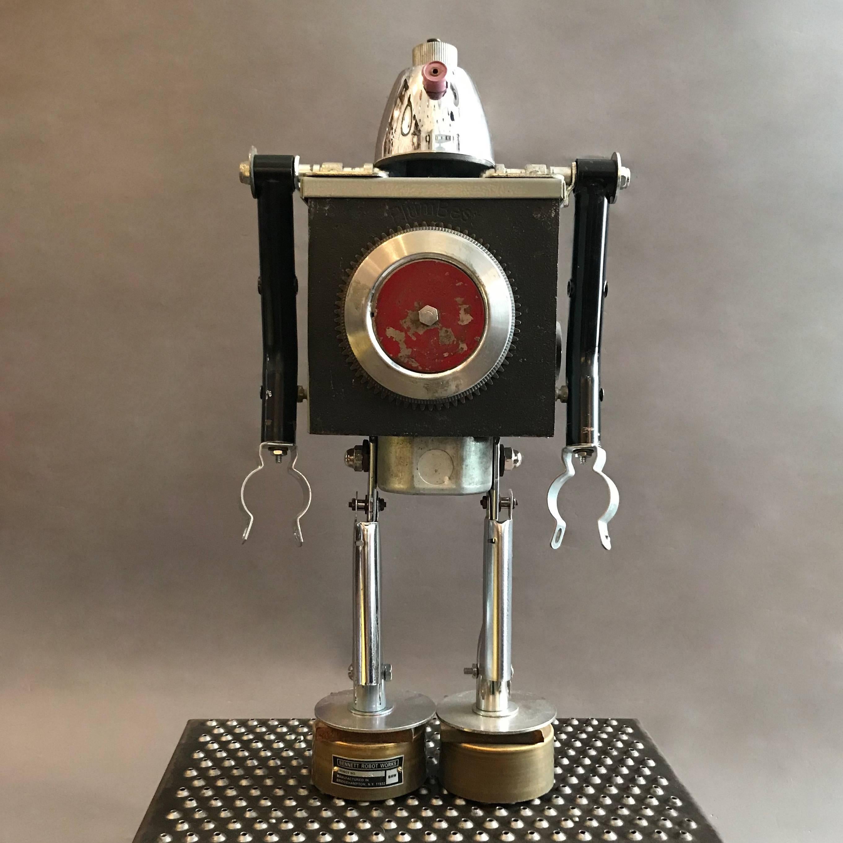 Custom robot sculpture named Plumbest by Bennett Robot Works, Brooklyn, NY

Bennett Robot Works, robot sculptures created by Gordon Bennett, are composed of found objects used in their unaltered entirety. They are inspired by Norman Bel Geddes and