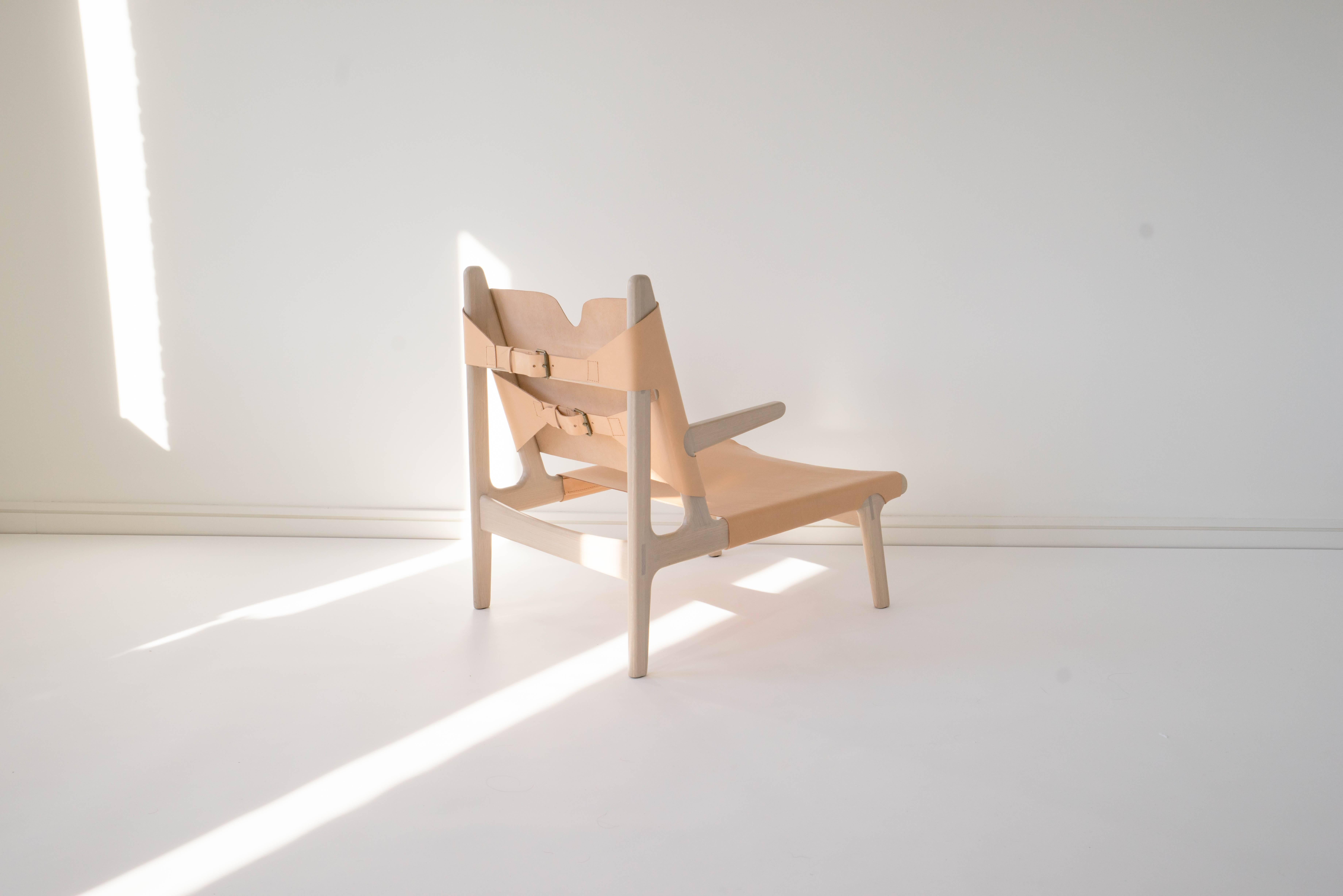 Sun at Six is a contemporary furniture design studio that works with traditional Chinese joinery masters to handcraft our pieces using traditional joinery. Vegetable tanned leather will patina with age. Exposed joinery throughout. Also available in