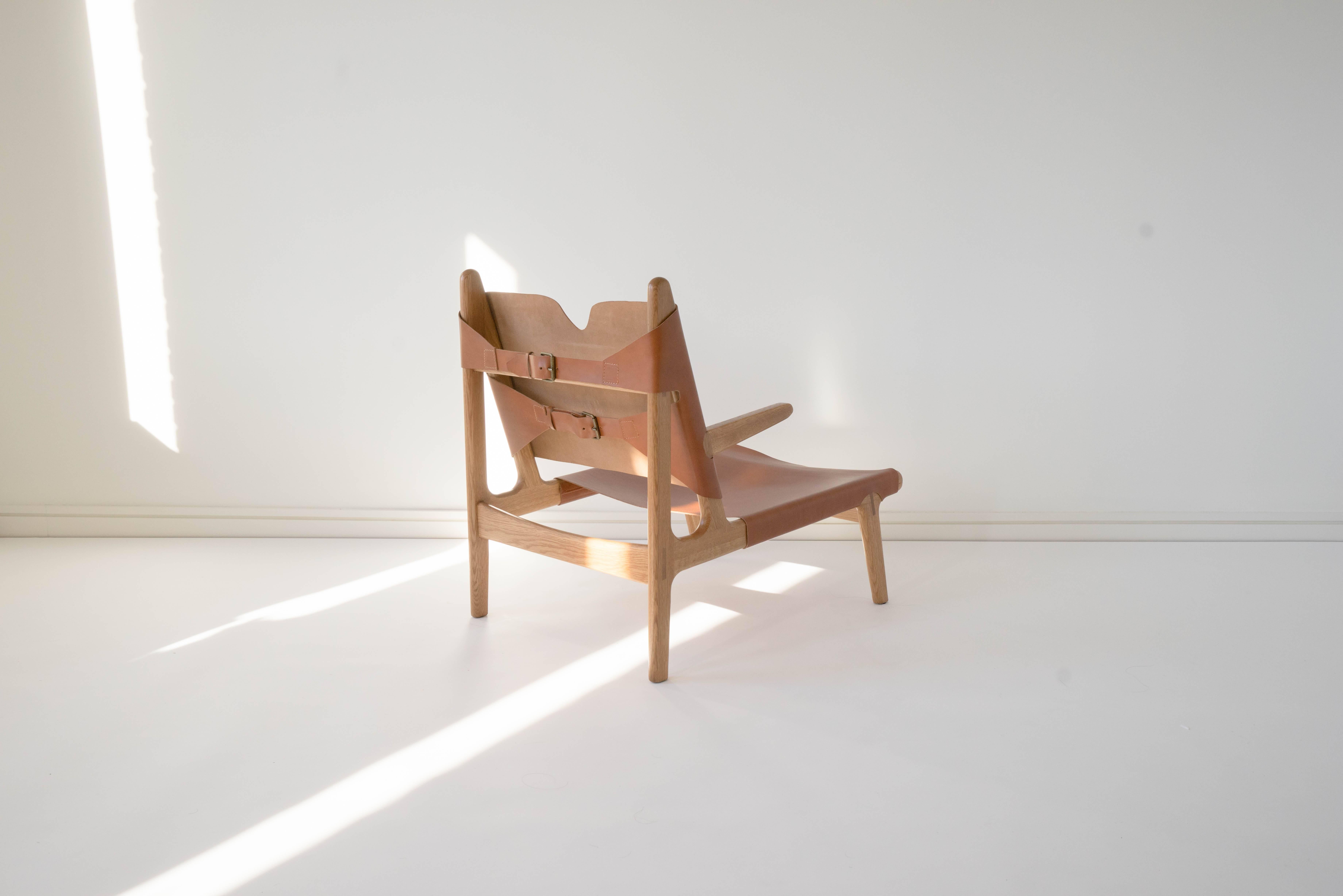 Sun at six is a contemporary furniture design studio that works with traditional Chinese joinery masters to handcraft our pieces using traditional joinery. Vegetable tanned leather will patina with age. Exposed joinery throughout. Also available in