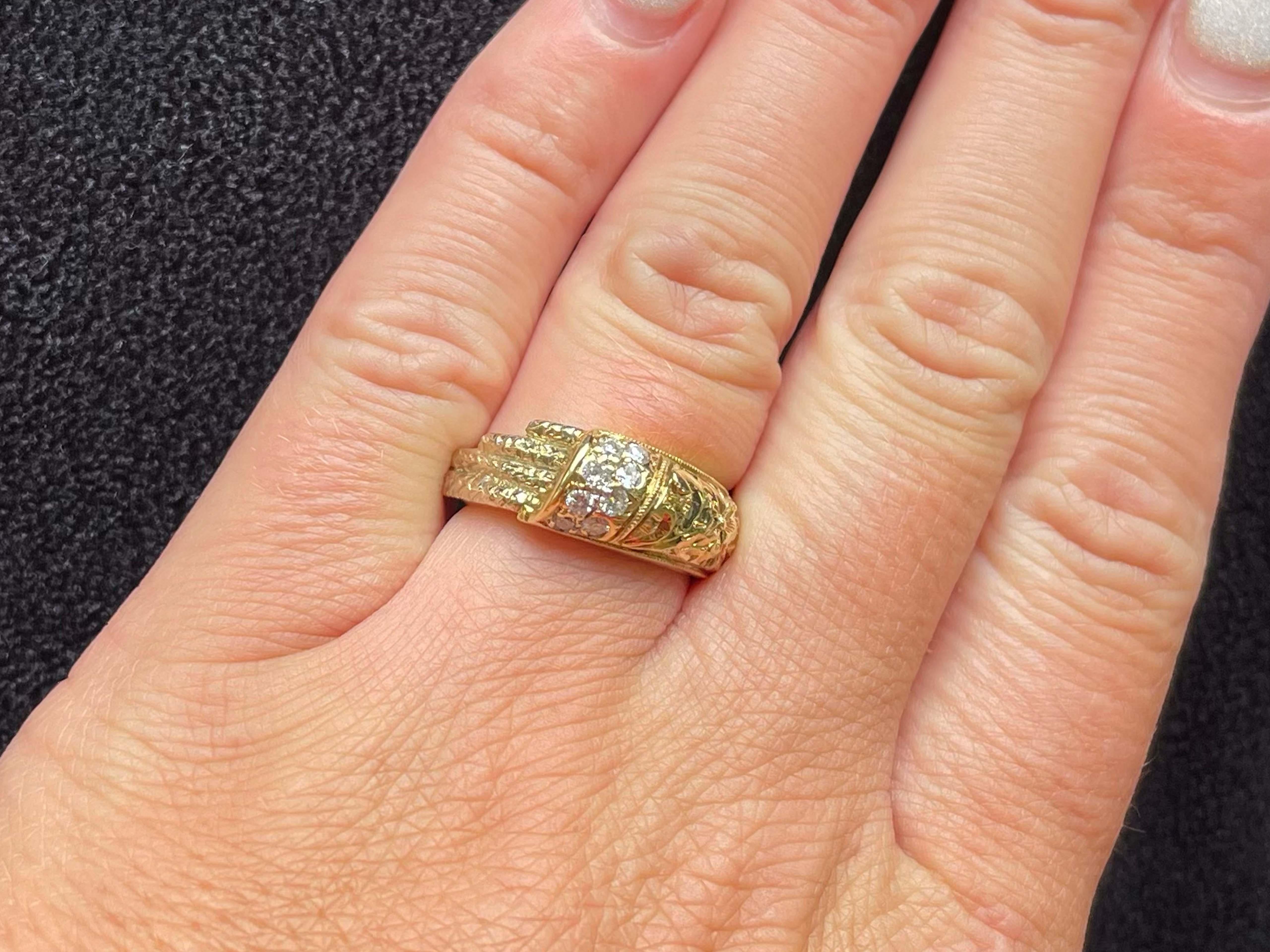 Item Specifications:

Metal: 18K Yellow Gold

Style: Statement Ring

Ring Size: 6 (resizing available for a fee)

Total Weight: 10.3 Grams
​
​Diamond Count: 8 diamonds

Diamond Carat Weight: 0.20

Diamond Color: G-I

Diamond Clarity: VS

Condition: