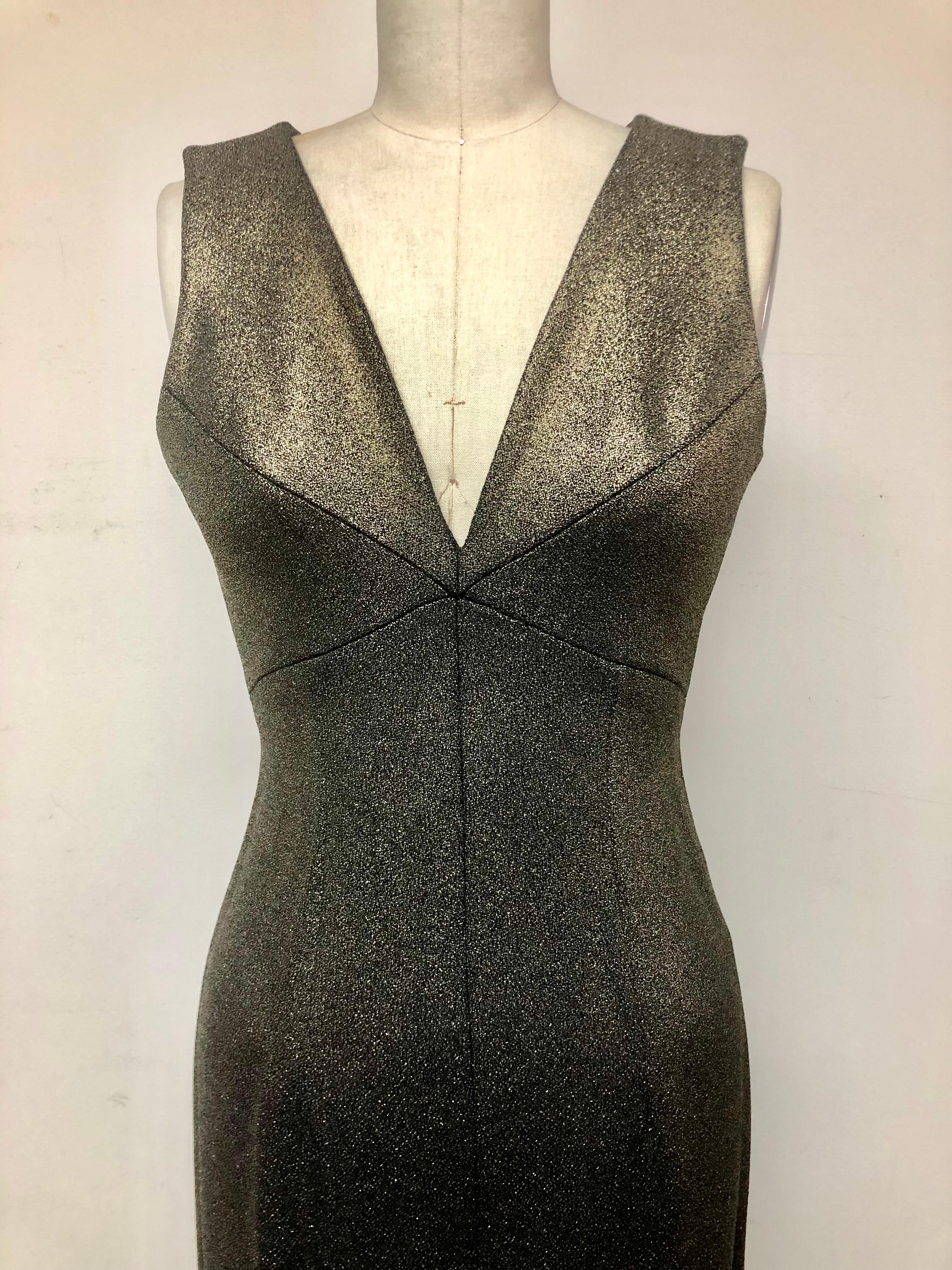 Unique flattering seaming makes for a shapely silhouette 
aka Body Dress. Taroni silk blend gold /black lame reflective quality makes for an elegant sheen that's perfect for holiday evening and beyond.
A perfect  Cocktail dress or Wedding Guest.