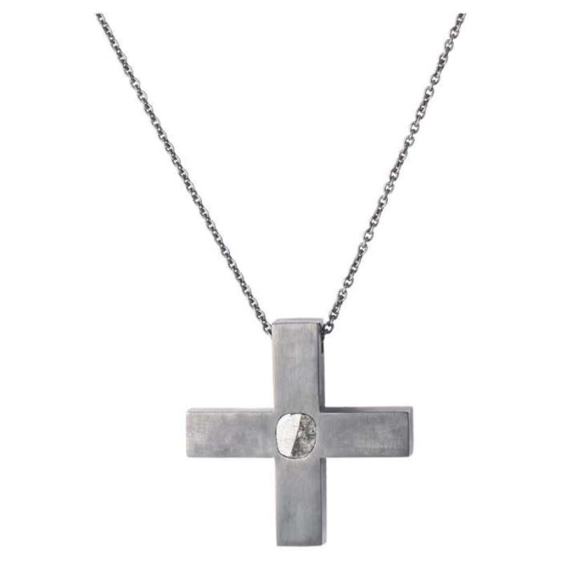 Disk necklace in oxydized sterling silver and a slab of rough diamond. This slab is removed from a larger chunk of diamond, it comes on a 74cm chain. This item is made with a naturally occurring element and will vary from the photograph you see.