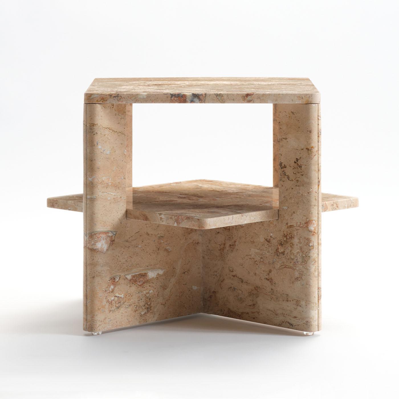 Minutely sculpted from a single Travertine block quarried from an ancient - today closed - quarry, this coffee table makes for a plush addition to contemporary-style decors. Two U-shaped slabs intersect for sustaining both the upper top and the