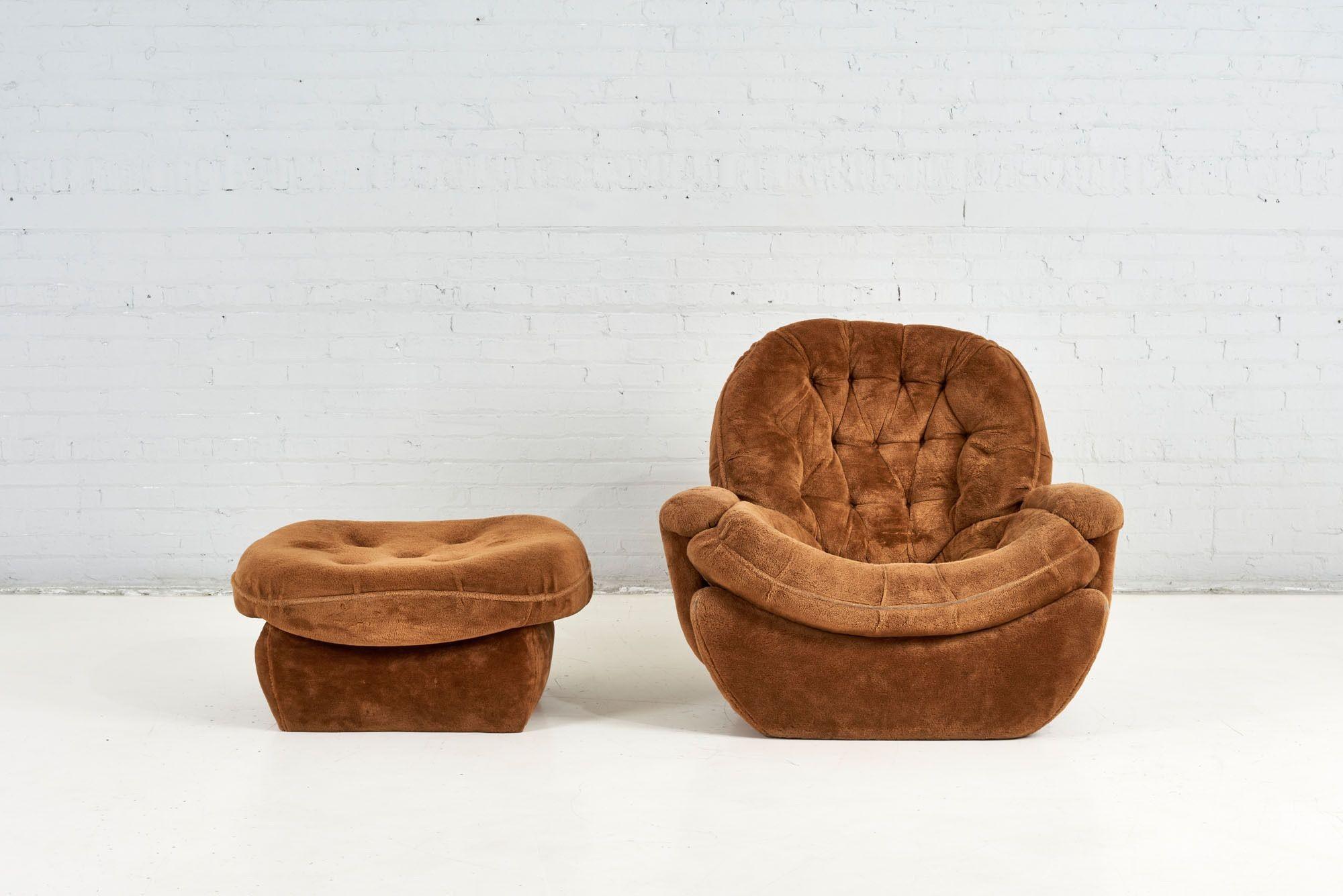 Plush 1970's lounge chair and ottoman 1970 original 70's upholstery. Ottoman measures 32