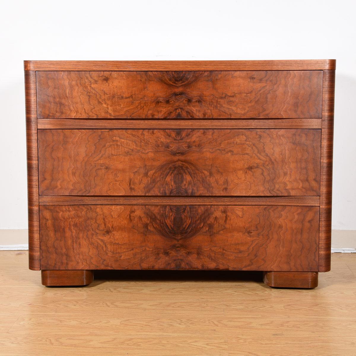 This 3-drawer chest features drop-dead gorgeous burled walnut on its front. Nicely sized with deep drawers, this will provide wonderful storage and make a statement wherever you choose to place it.

