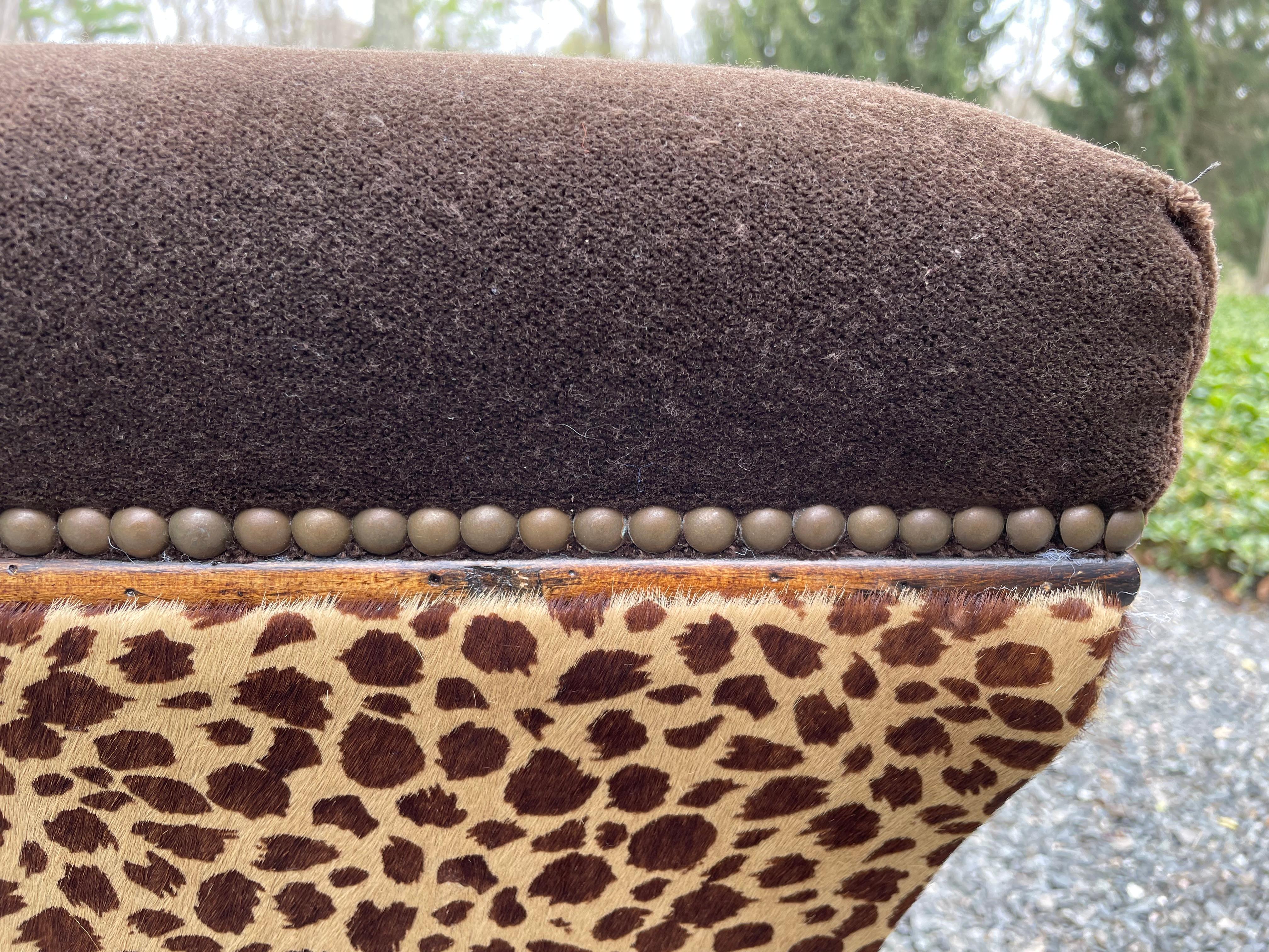 Upholstery Plush Pair of Animal Print Mohair & Cowhide Upholstered Hourglass Ottomans For Sale