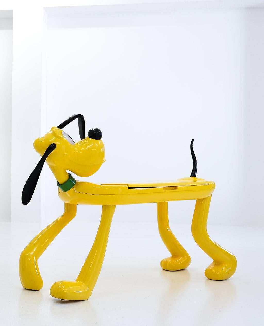 Pluto‘ kids table / play desk, by pierre colleu for disney, manufactured by starform, france, 1980s, painted resin, laminated wood, plastic. Good original condition with minor wear, consistent with age and usage.