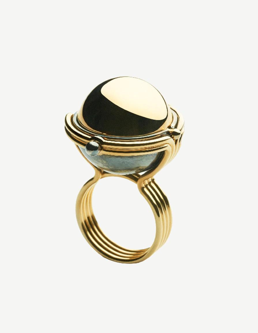 Diamonds Pluton Ring in 18k yellow gold by Elie Top. 18K Yellow Gold Pluton Ring. Rotating sphere opening on a diamond globe, circled with white and yellow gold diamond encrusted satellites.