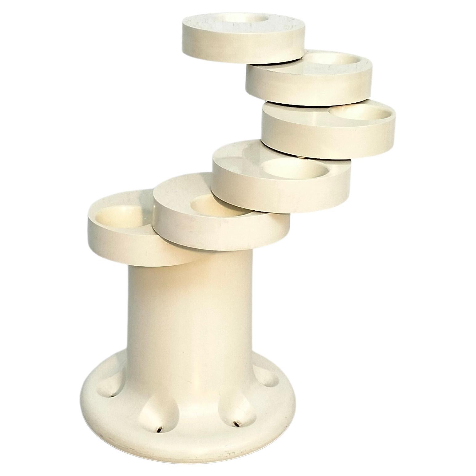 White umbrella stand  Pluvium designed by Giancarlo Piretti and produced by Aanonima Castelli, Italy, 19760s.
An amazing umbrella stand made of plastic in white color created to hold six umbrellas when the umbrella stand is folded up.
Also to push
