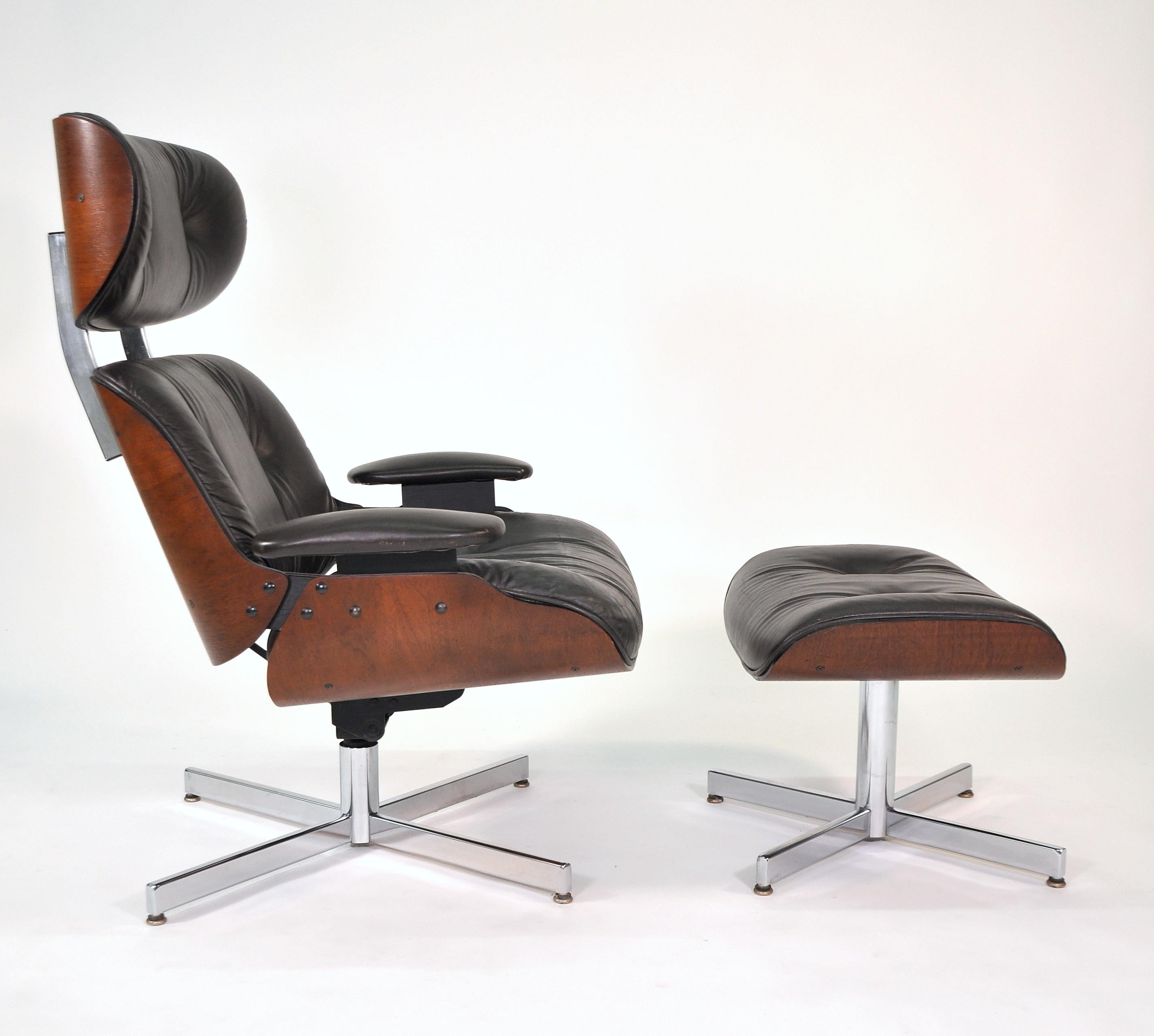 Vintage Mid-Century Modern dark chocolate brown leather Eames style lounge and stool, by Plycraft, dating from the 1960s. The armchair swivels, tilts and is very comfortable, the footstool is fixed. They feature walnut bentwood shells with tufted